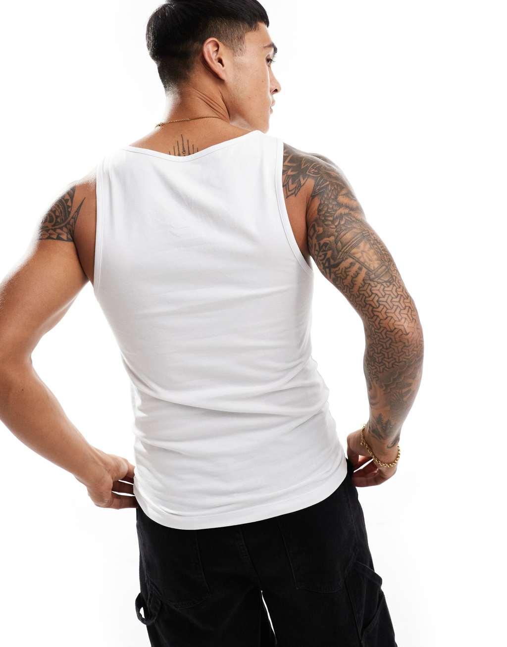 ASOS DESIGN 2 pack muscle tank tops in purple and white Product Image