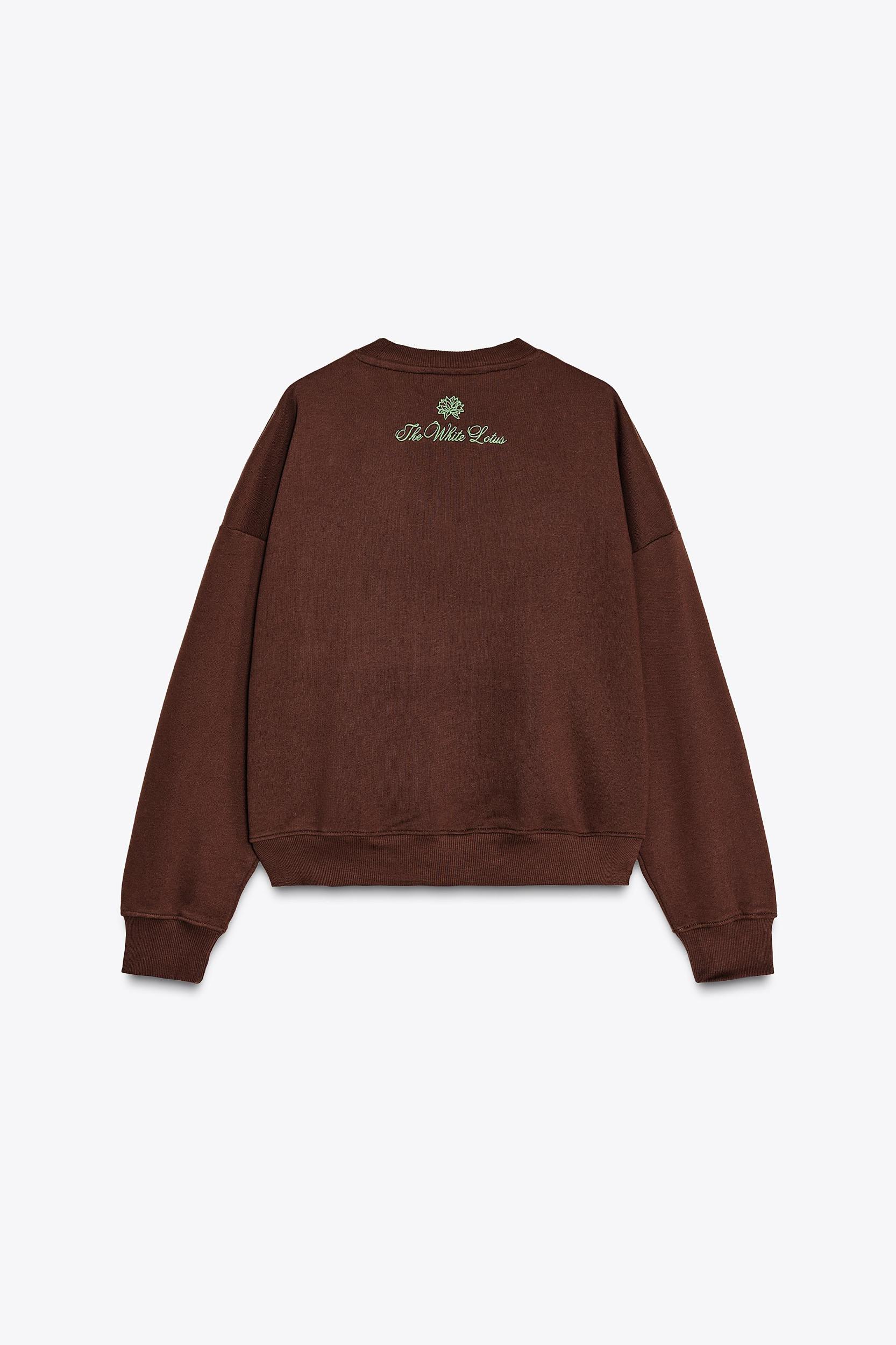 THE WHITE LOTUS FLEECE SWEATSHIRT Product Image