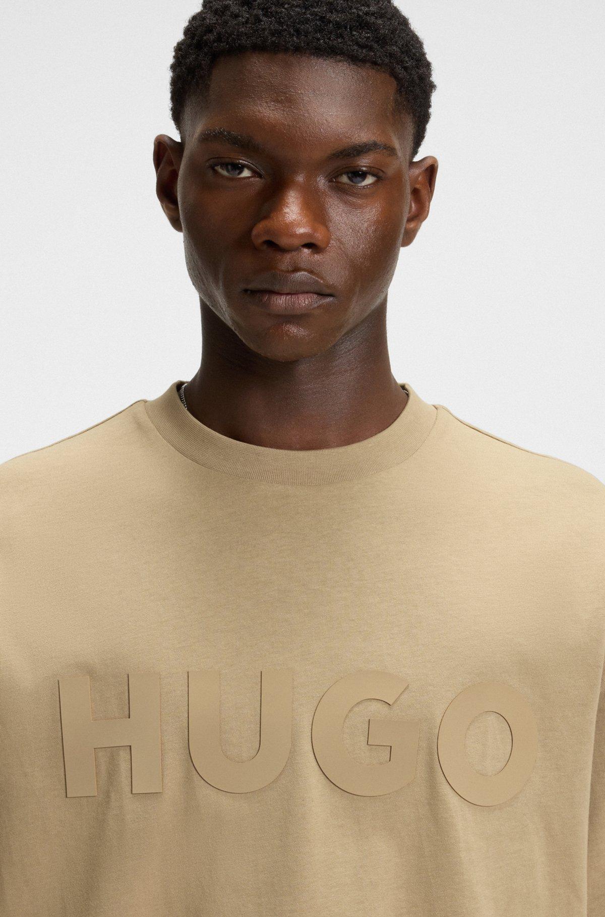 HUGO - Oversize-fit T-shirt in cotton with decorative reflective logo - Beige Product Image
