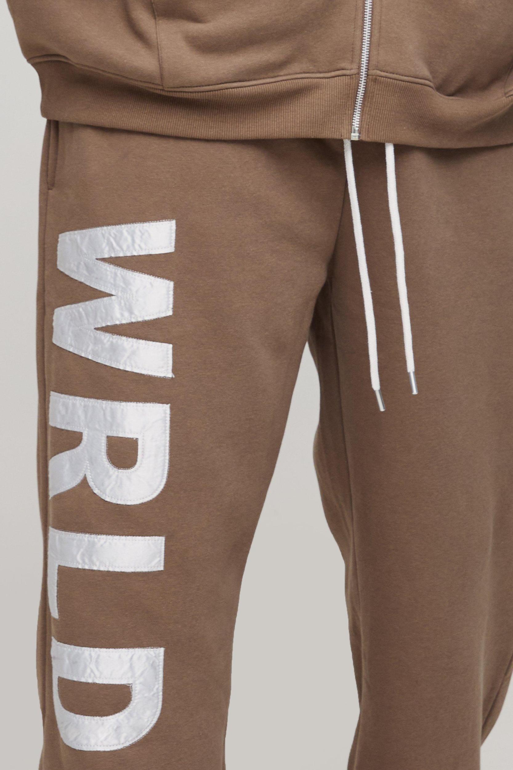Plus Relaxed Satin Applique WRLDWD Joggers | boohooMAN USA Product Image