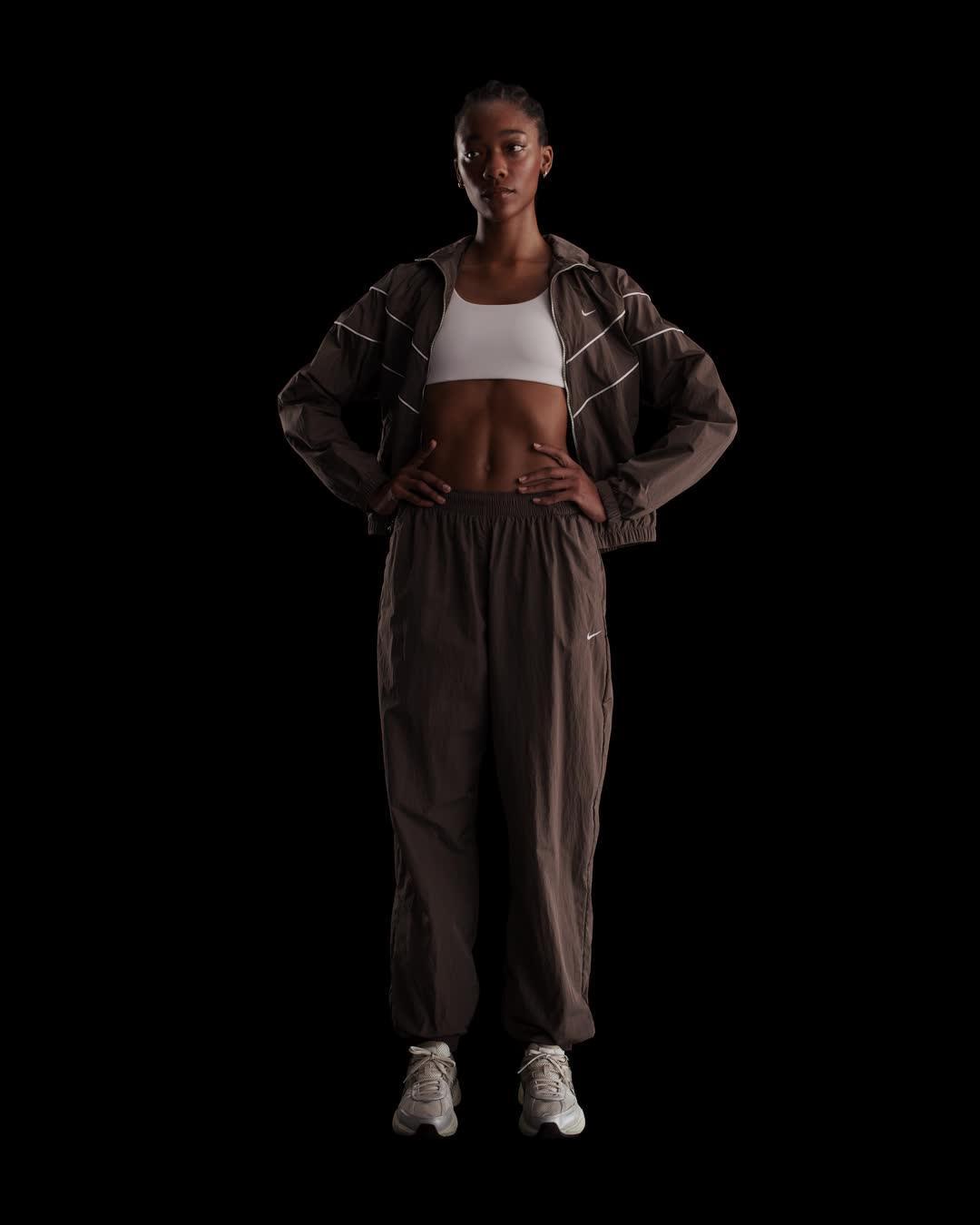 Nike Sportswear Essential Women's Mid-Rise Oversized Woven Joggers Product Image