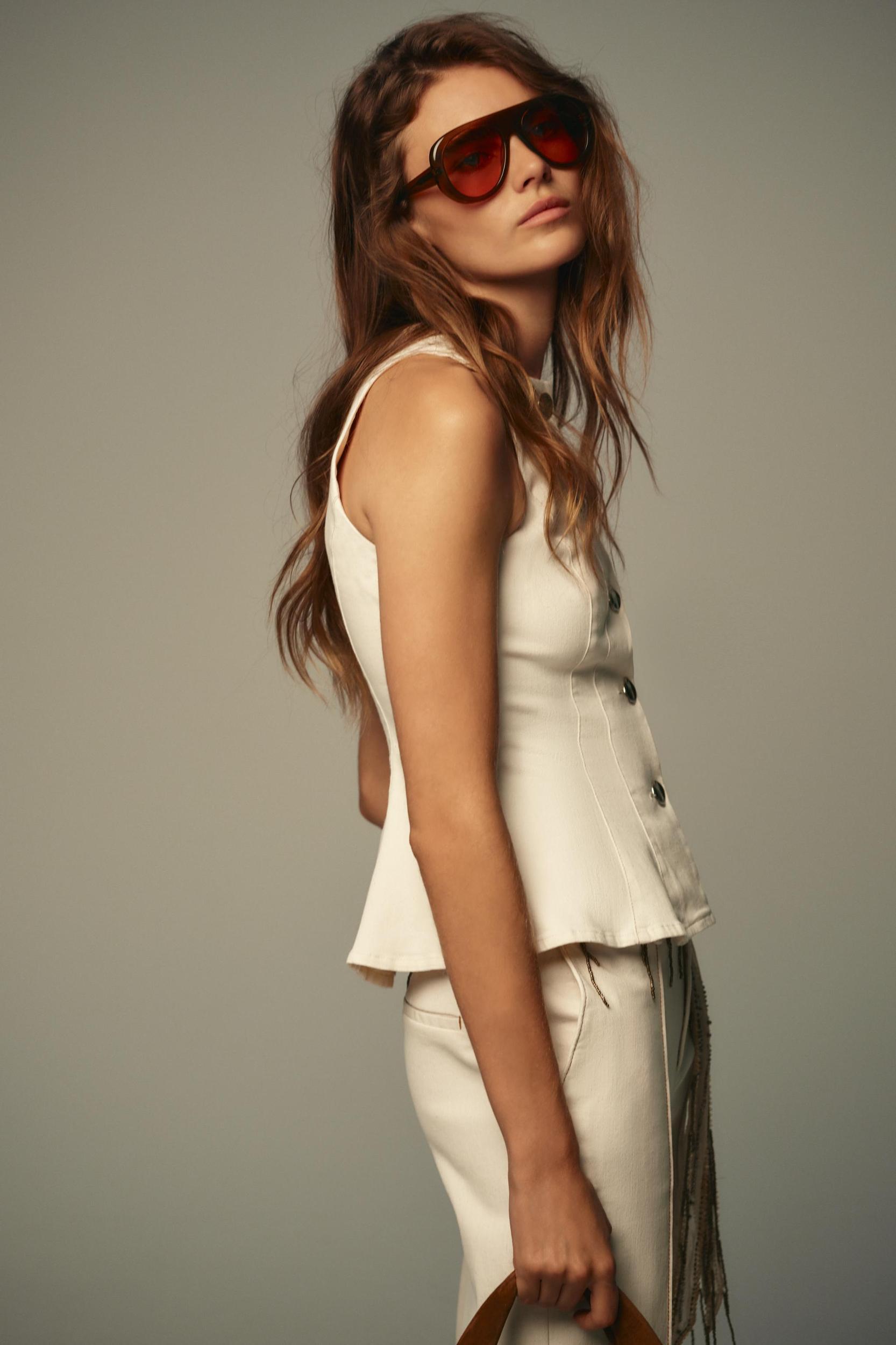 STITCHED PEPLUM VEST Product Image