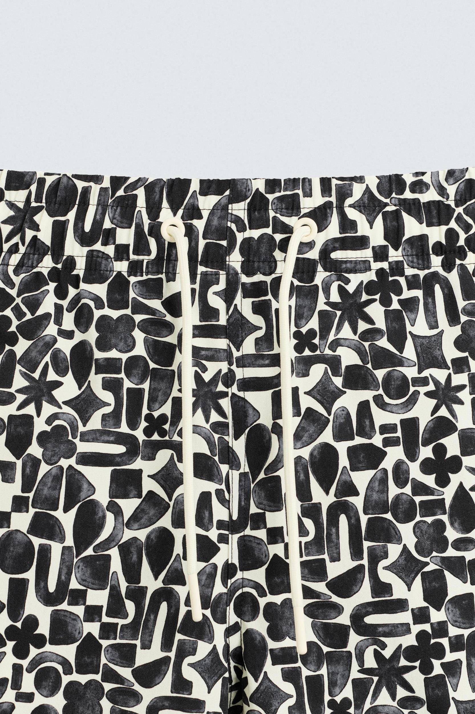 GEOMETRIC PRINT LONG SWIMSUIT Product Image