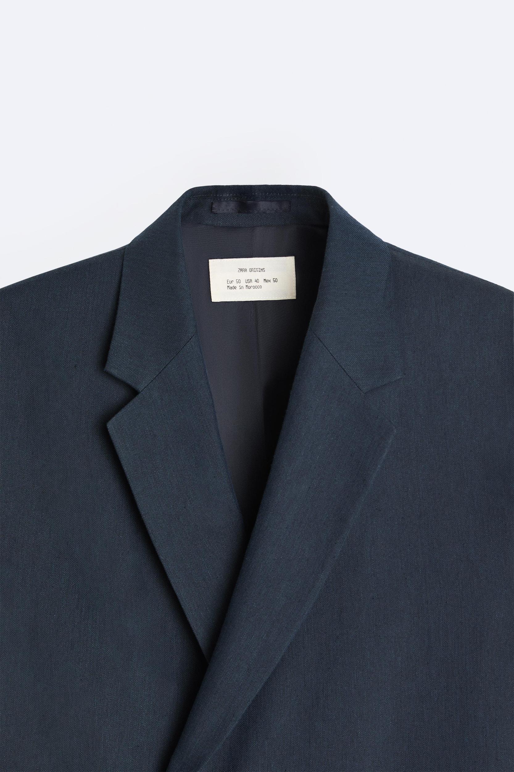 DOUBLE BREASTED HERRINGBONE SUIT JACKET Product Image