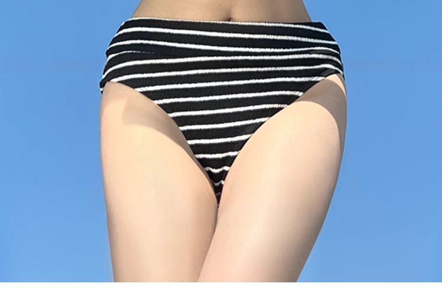 Set: Short-Sleeve Crew Neck Plain Crop T-Shirt + Cutout Bikini Top + Striped Bottom Product Image