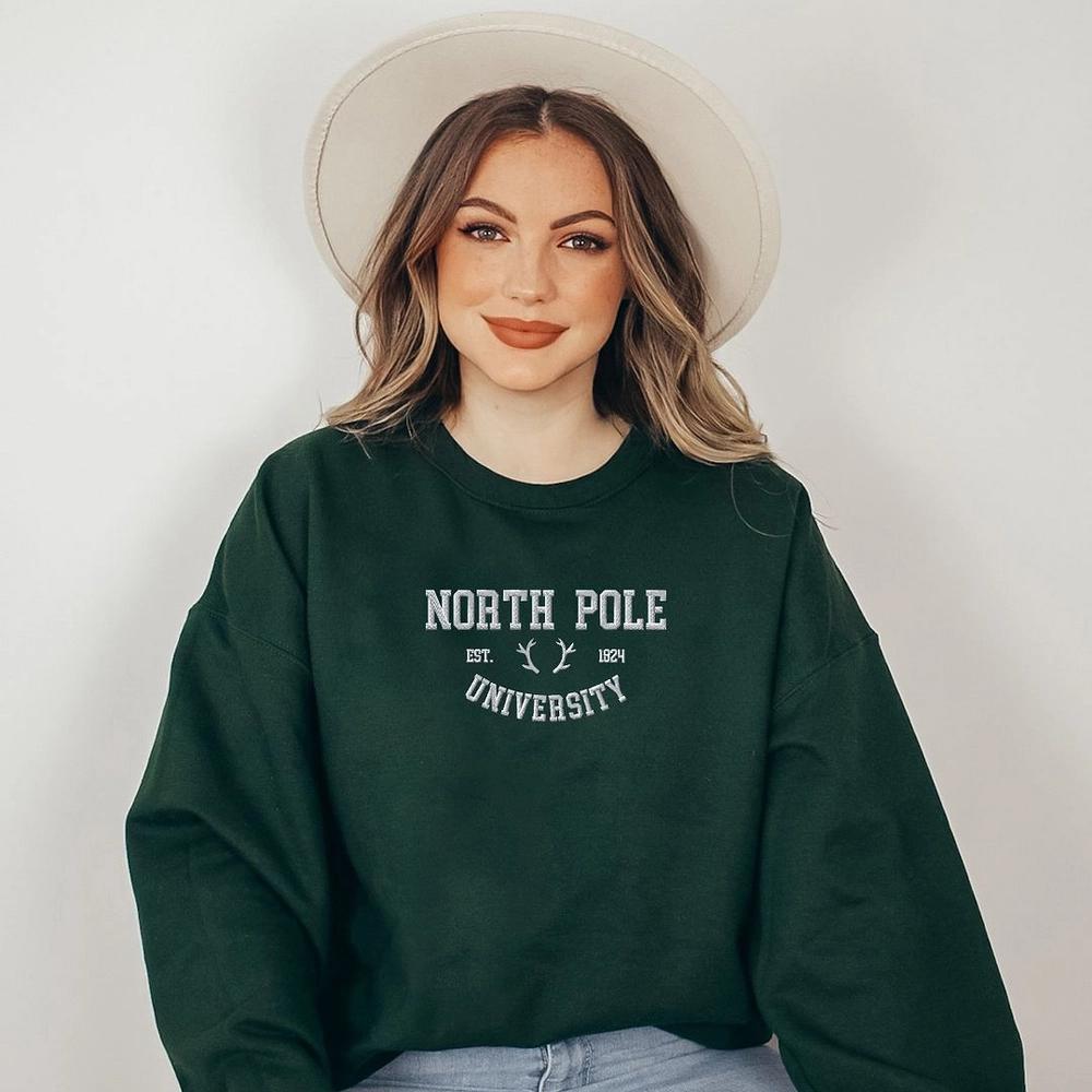 Simply Sage Market Women's Graphic Sweatshirt EmbroideredNorth Pole University -White Ink Product Image