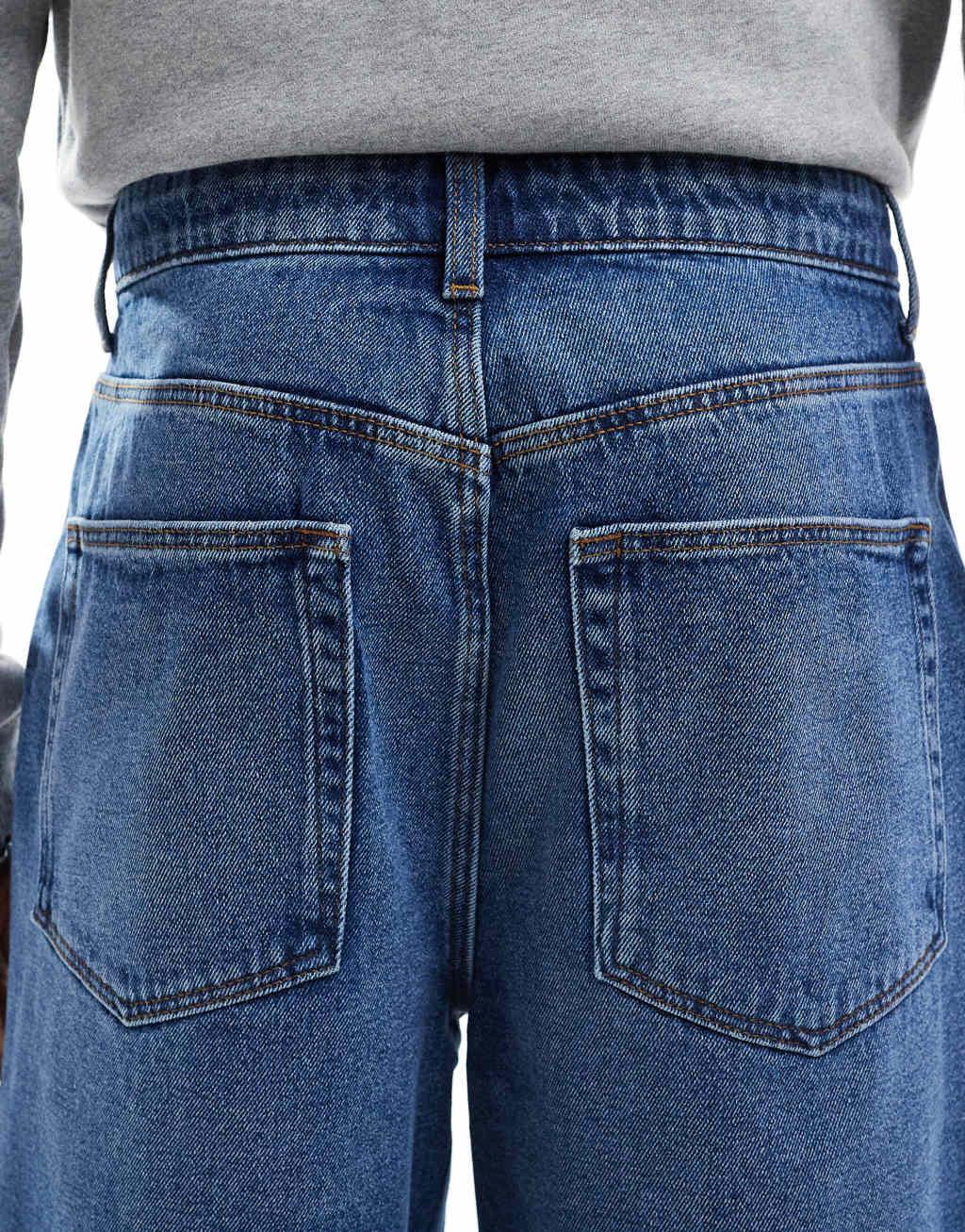 ASOS DESIGN standard length jort in mid wash blue Product Image