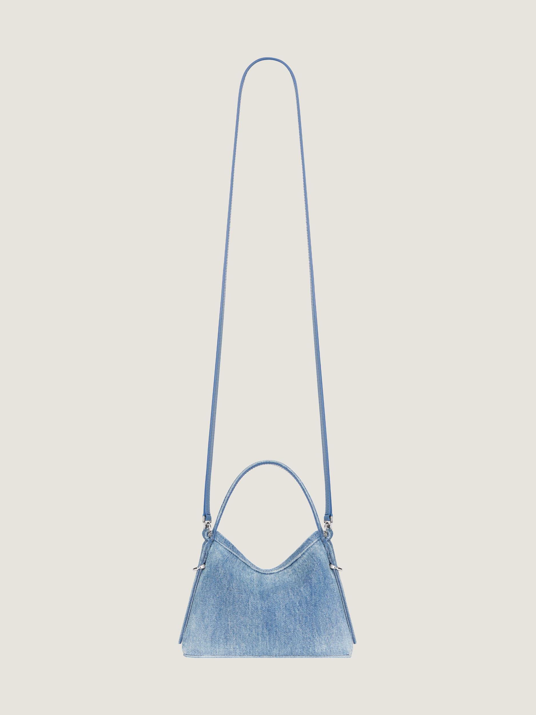 Nano Voyou bag in washed denim Product Image