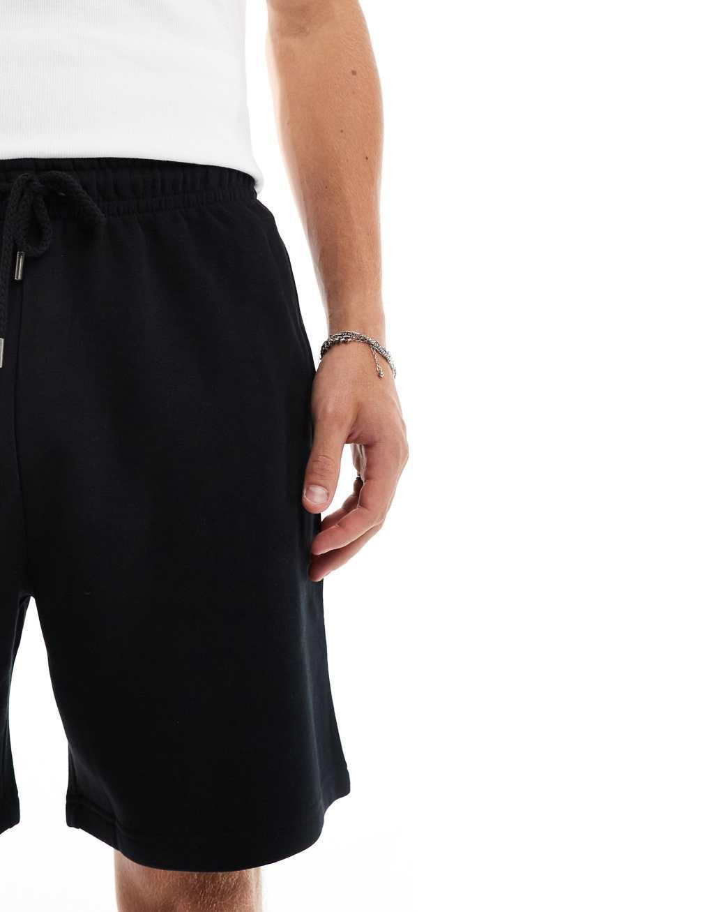 COLLUSION jersey shorts in black Product Image