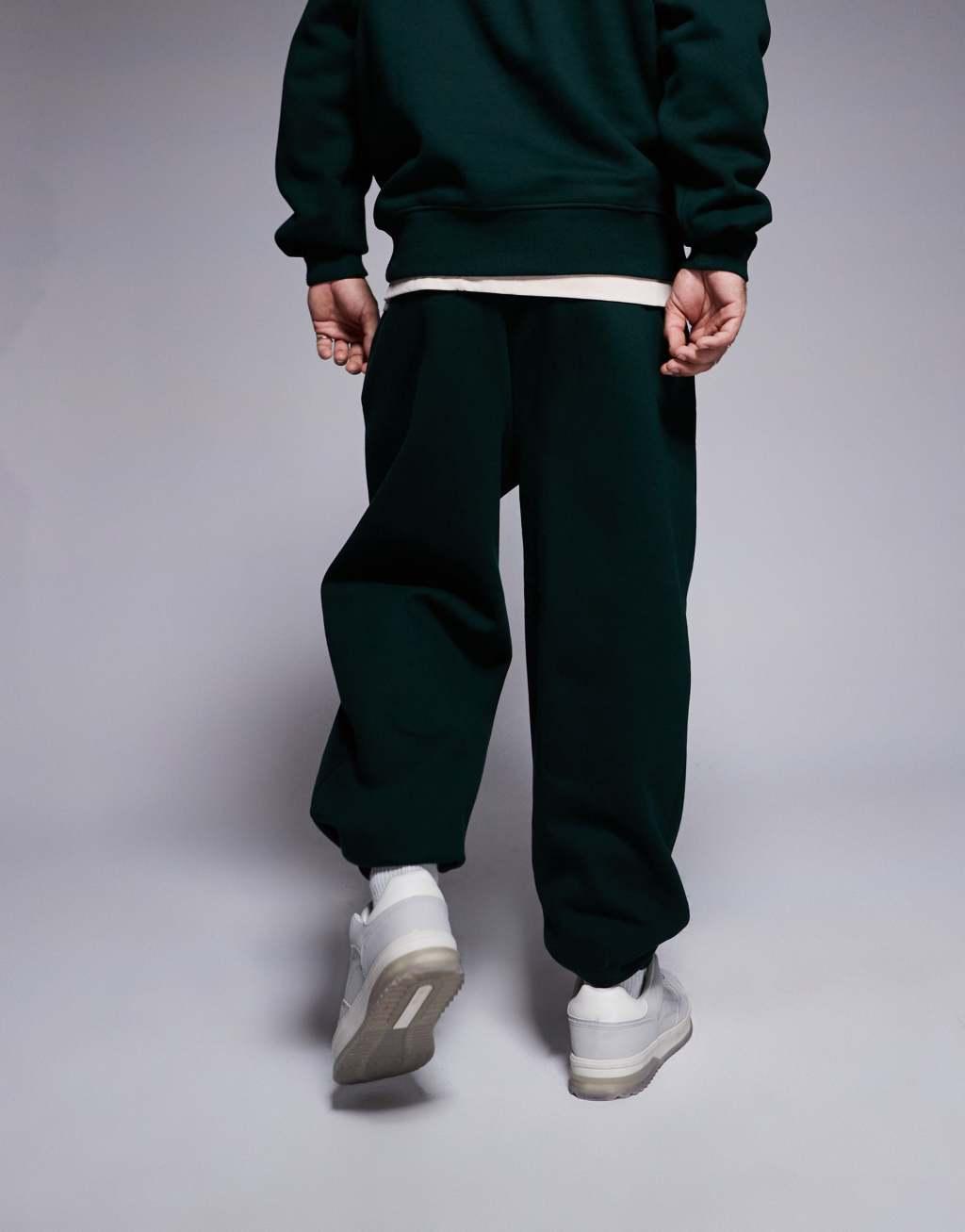 ASOS DESIGN premium heavyweight oversized sweatpants in forest green Product Image