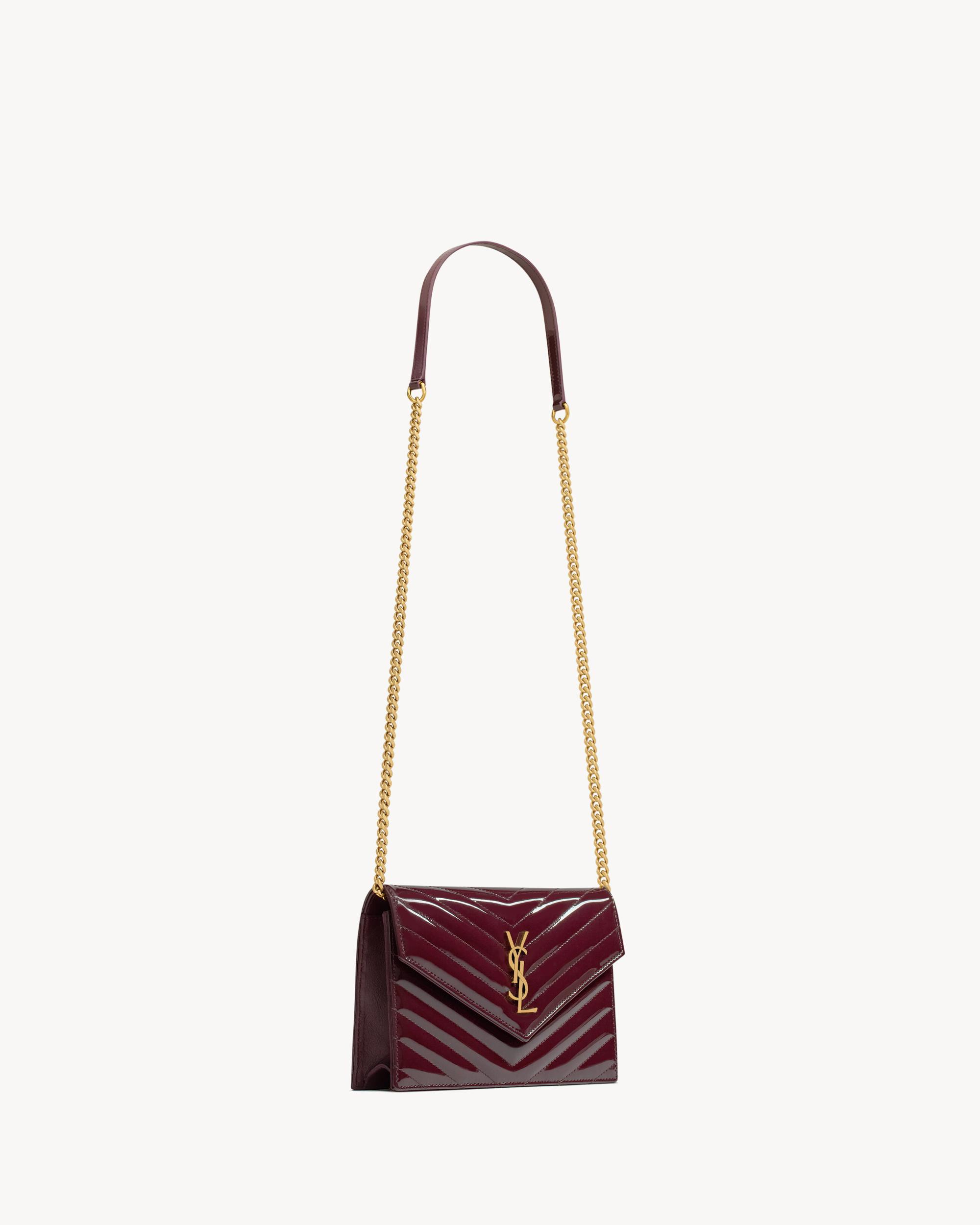 CASSANDRE envelope chain wallet in patent leather Product Image