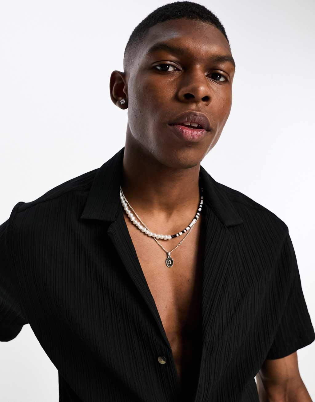 ASOS DESIGN relaxed shirt in smart ribbed quality in black Product Image