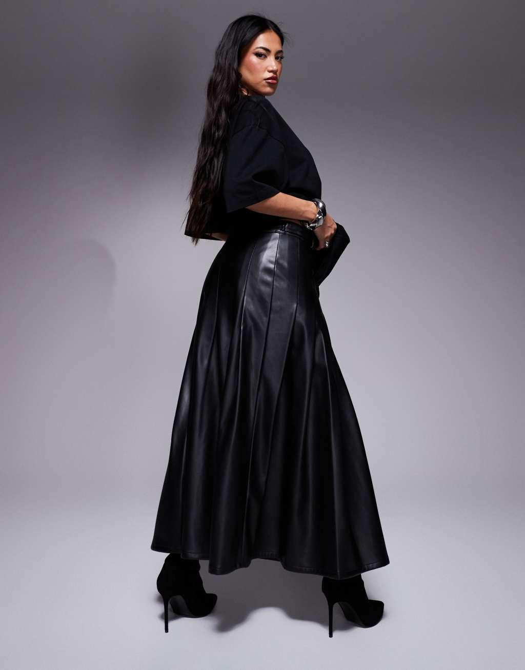 River Island faux leather pleated midi skirt in black Product Image