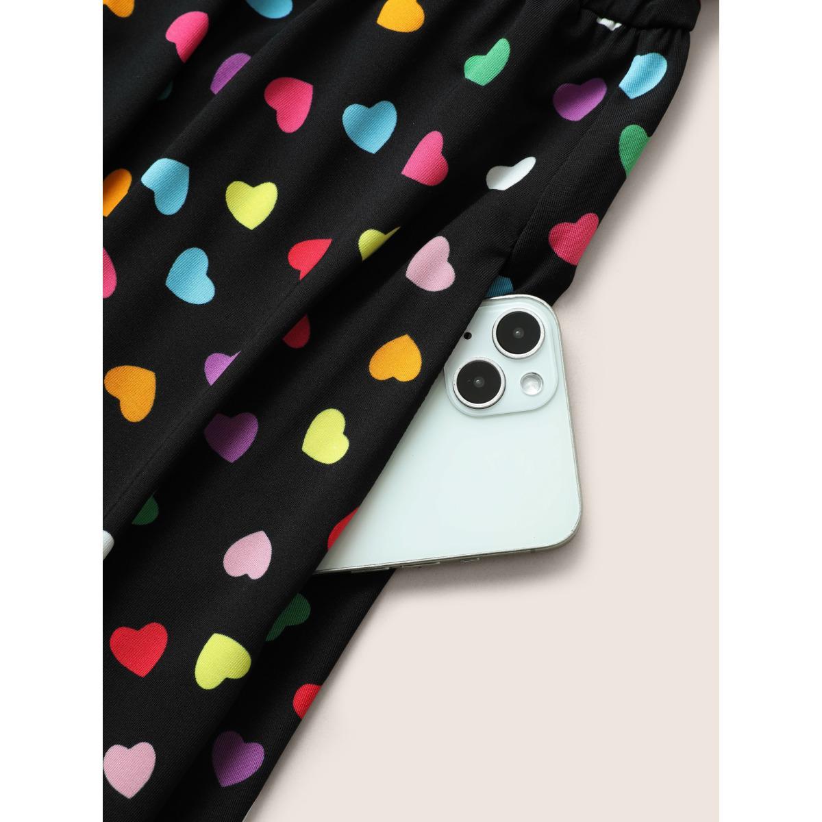 Plus Size Colored Heart Print Belted Overlap Collar Dress Black Women Casual Belted Overlap Collar Elbow-length sleeve Curvy Midi Dress BloomChic 12/L Product Image