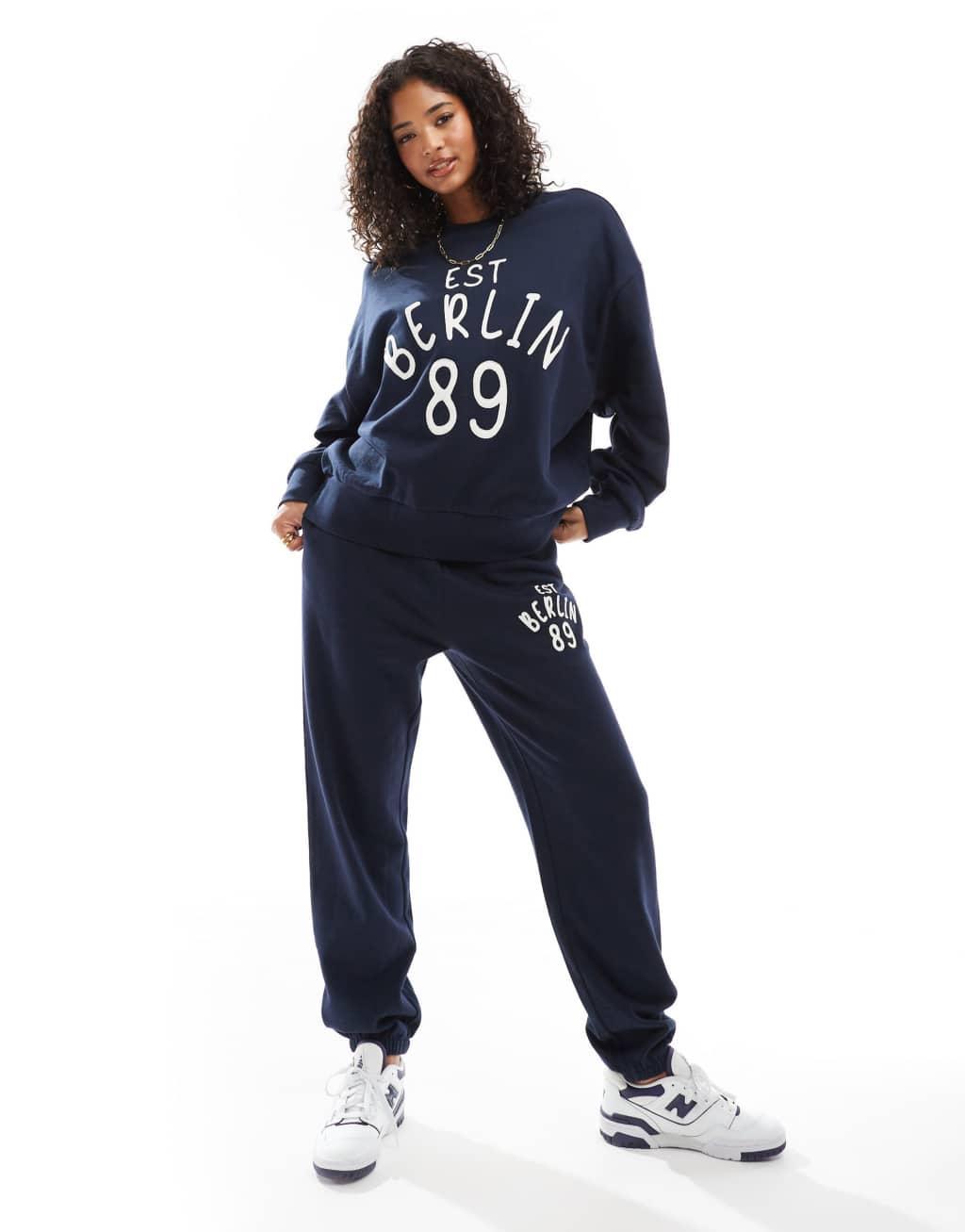 ASOS DESIGN sweat with applique berlin graphic in navy - part of a set Product Image