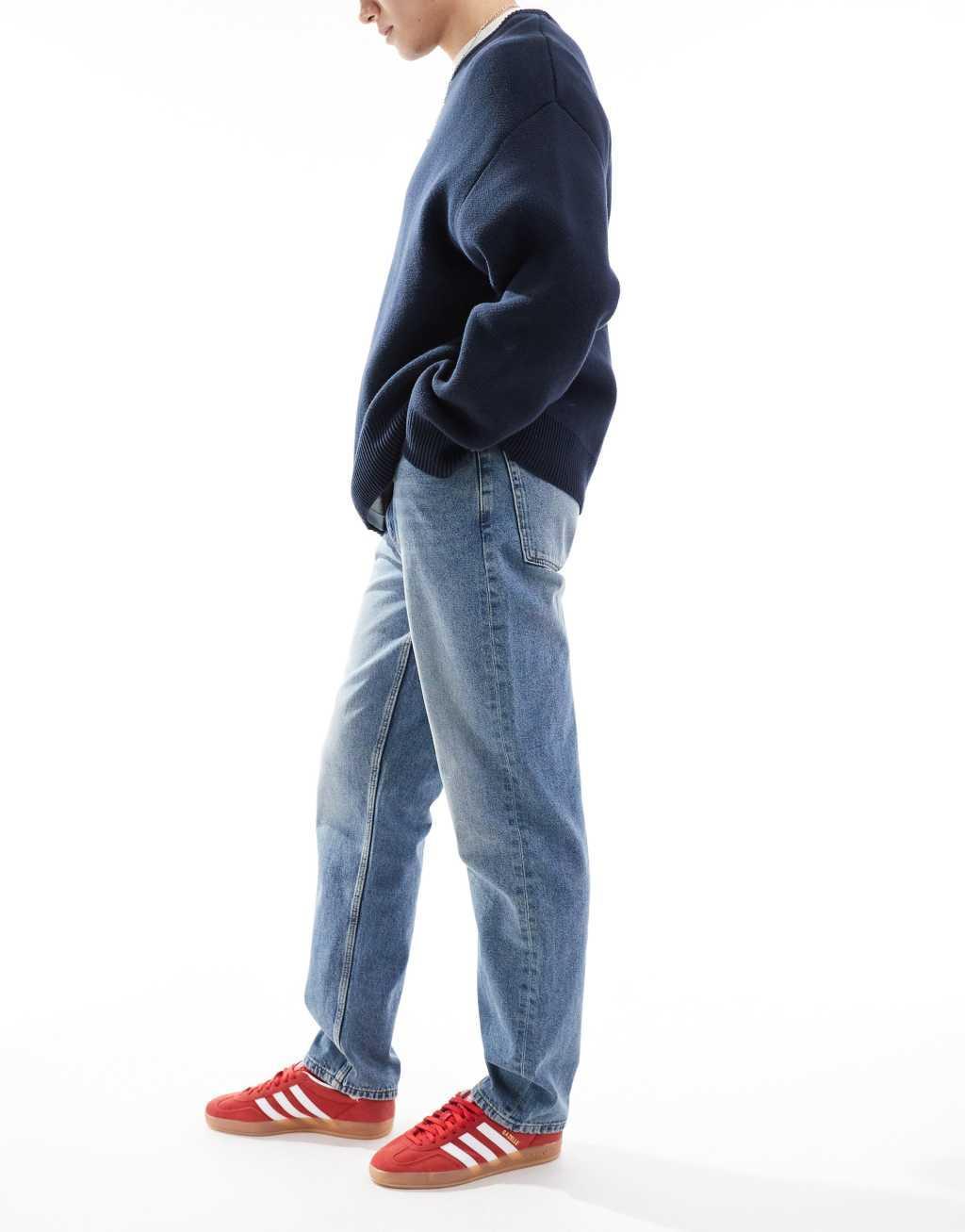 ASOS DESIGN straight fit jeans in mid wash blue Product Image