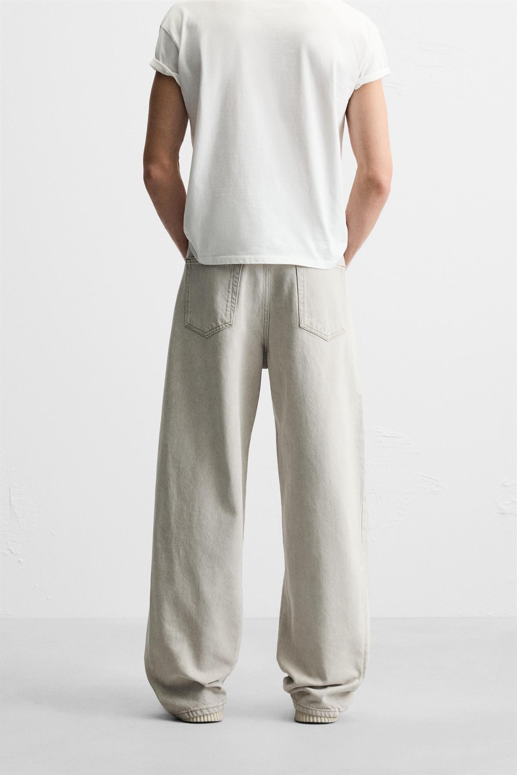 ASYMMETRIC SEAM BAGGY FIT JEANS Product Image