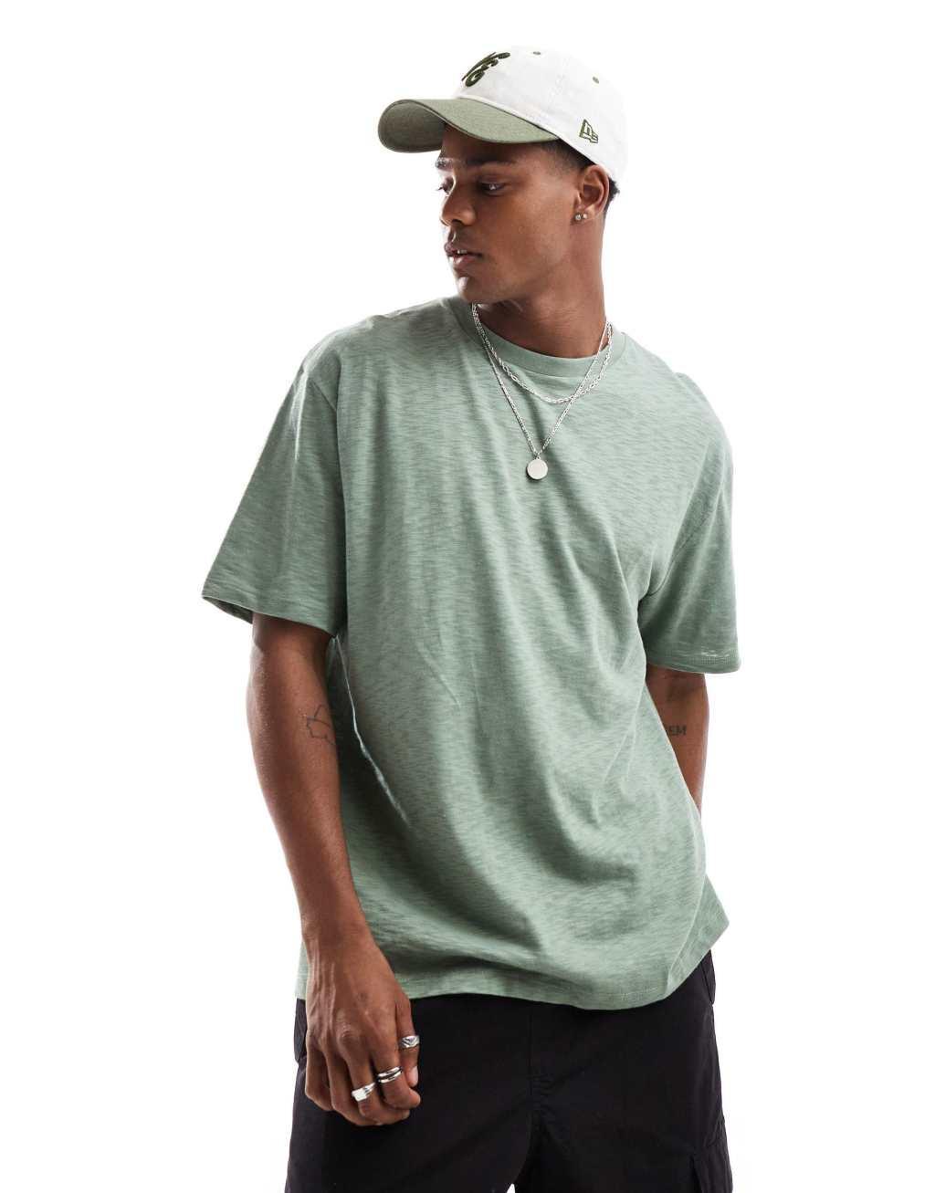ASOS DESIGN relaxed t-shirt in green fabric with celestial back print Product Image