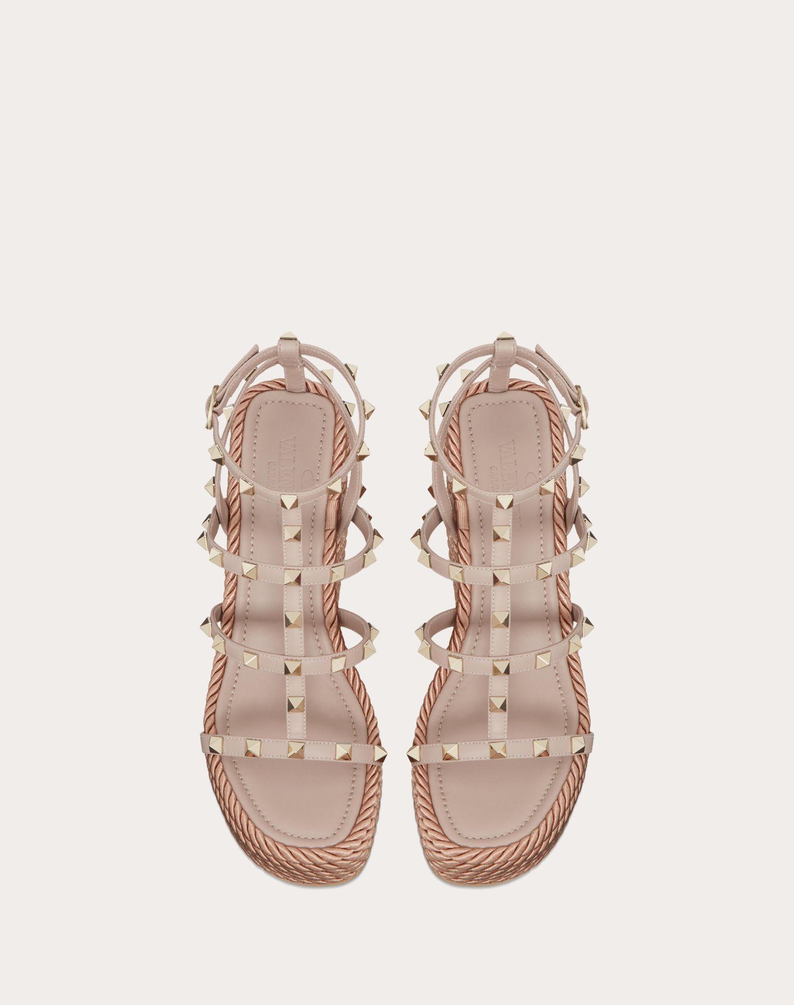 ROCKSTUD ANKLE STRAP WEDGE SANDAL IN CALFSKIN LEATHER 95 MM Product Image