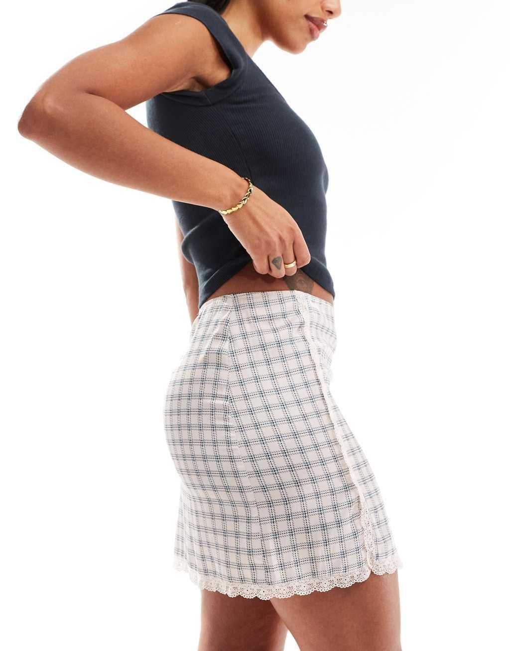 Monki mini satin lace skirt in pink plaid Product Image