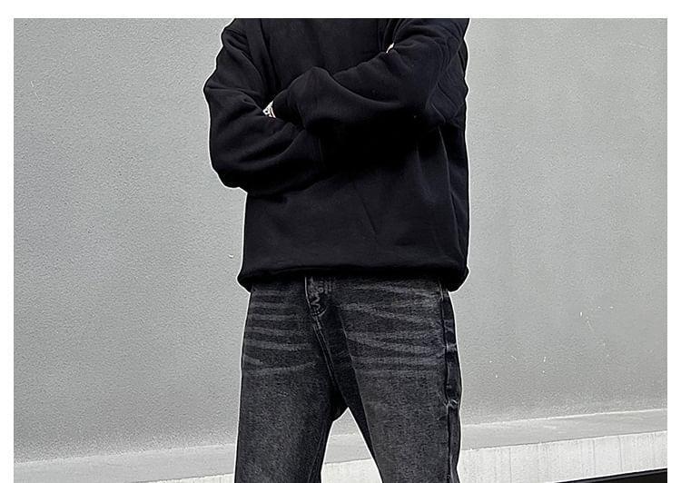 Mid Rise Washed Distressed Flared Jeans Product Image