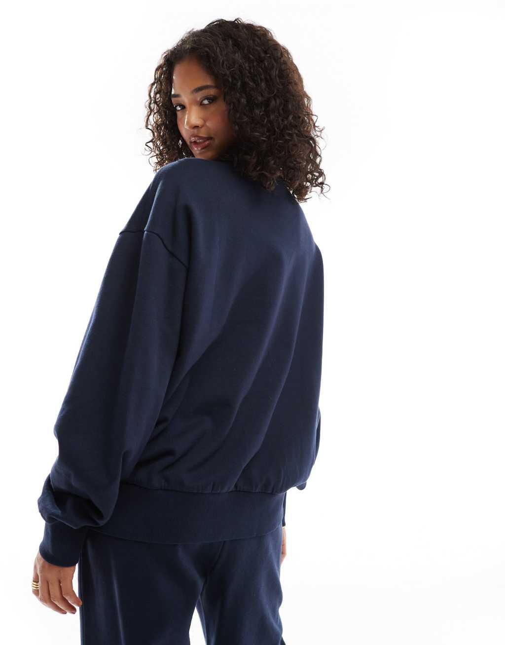 ASOS DESIGN sweat with applique berlin graphic in navy - part of a set Product Image