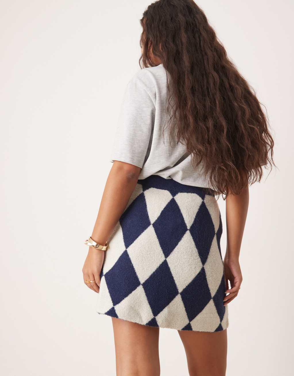 Neon Rose argyle knit mini skirt in navy Product Image