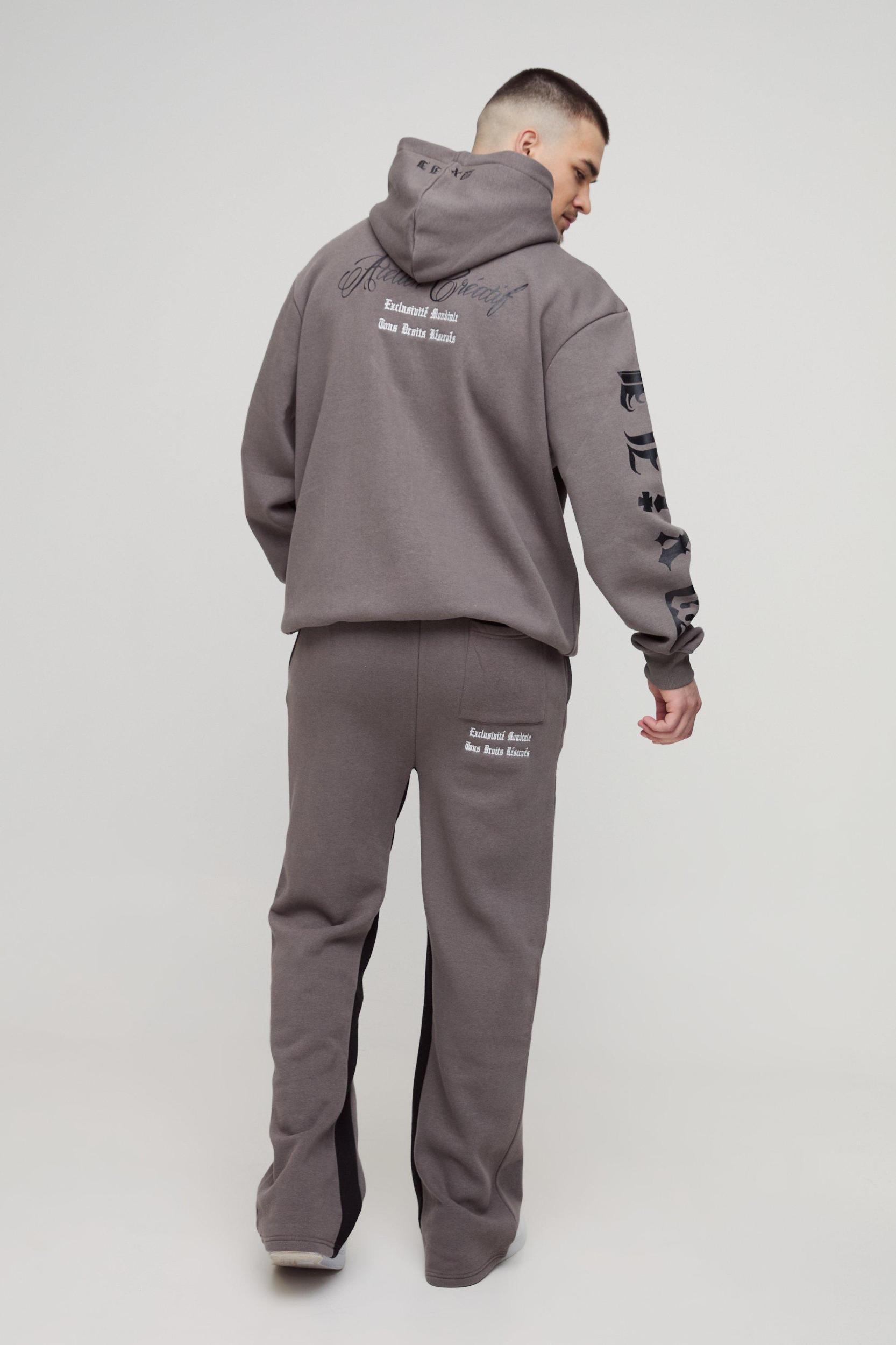 Tall Oversized Official Embroidery Hooded Relaxed Flare Tracksuit | boohooMAN USA Product Image
