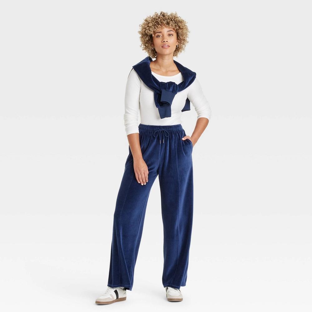 Women's Leisure Studio Mid-Rise Velour Sweatpants - Universal Thread™ Navy Blue S Product Image