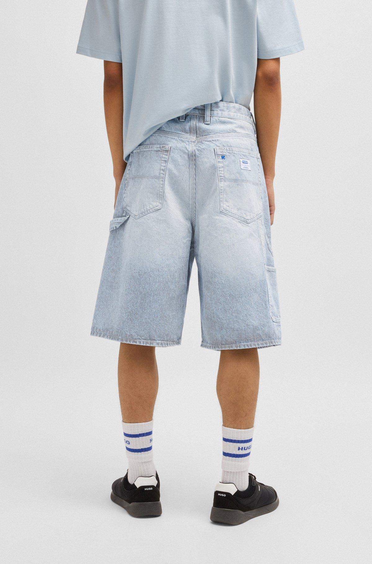 Wide-leg shorts in striped blue denim Product Image