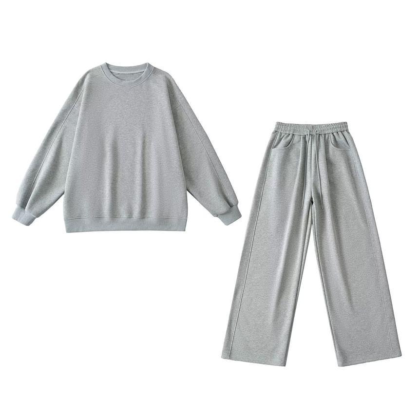 Set: Round Neck Plain Pullover + Mid Waist Wide Leg Pants Product Image