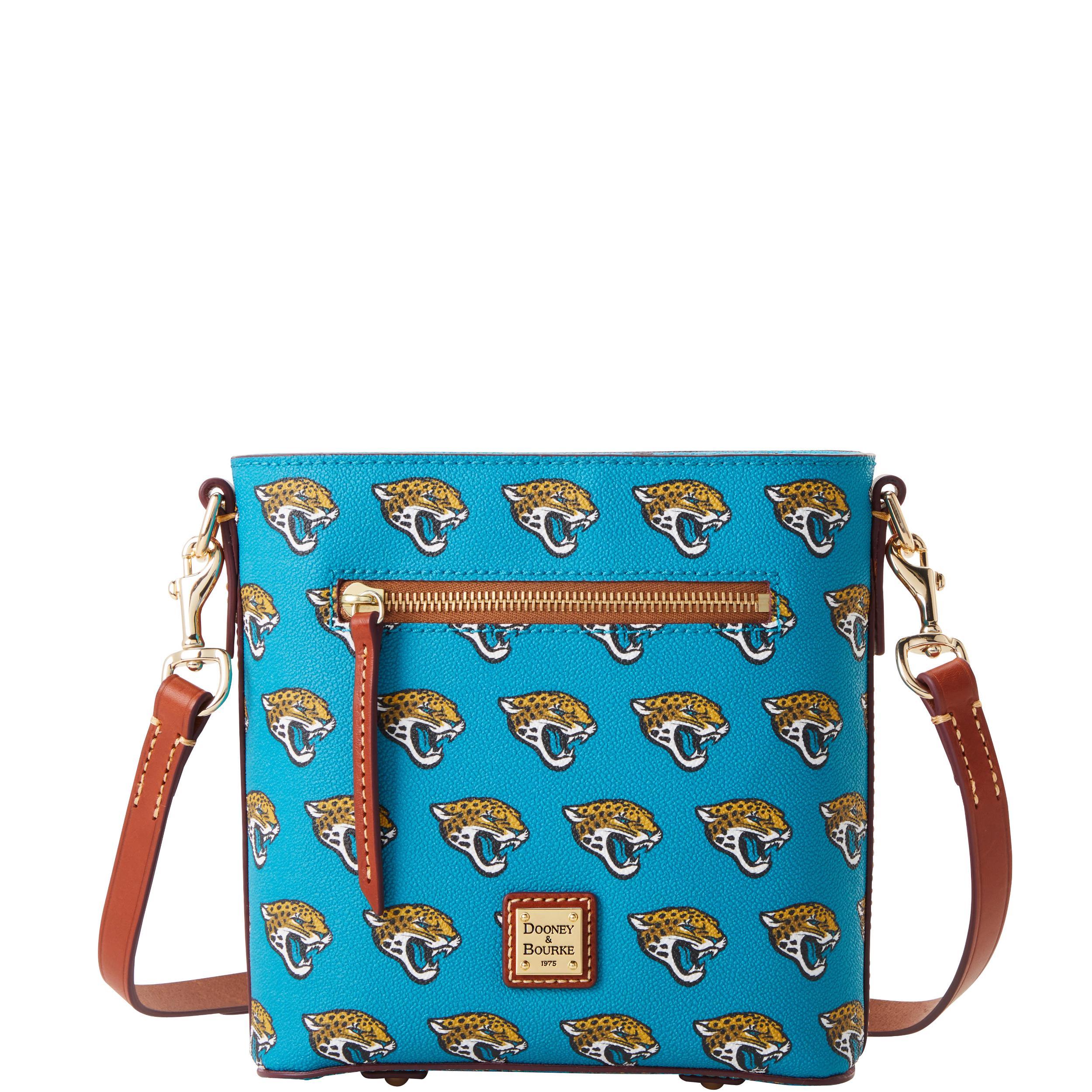Dooney & Bourke Womens NFL Jaguars Small Zip Crossbody Coated Cotton Shoulder Bag in Turquoise Product Image