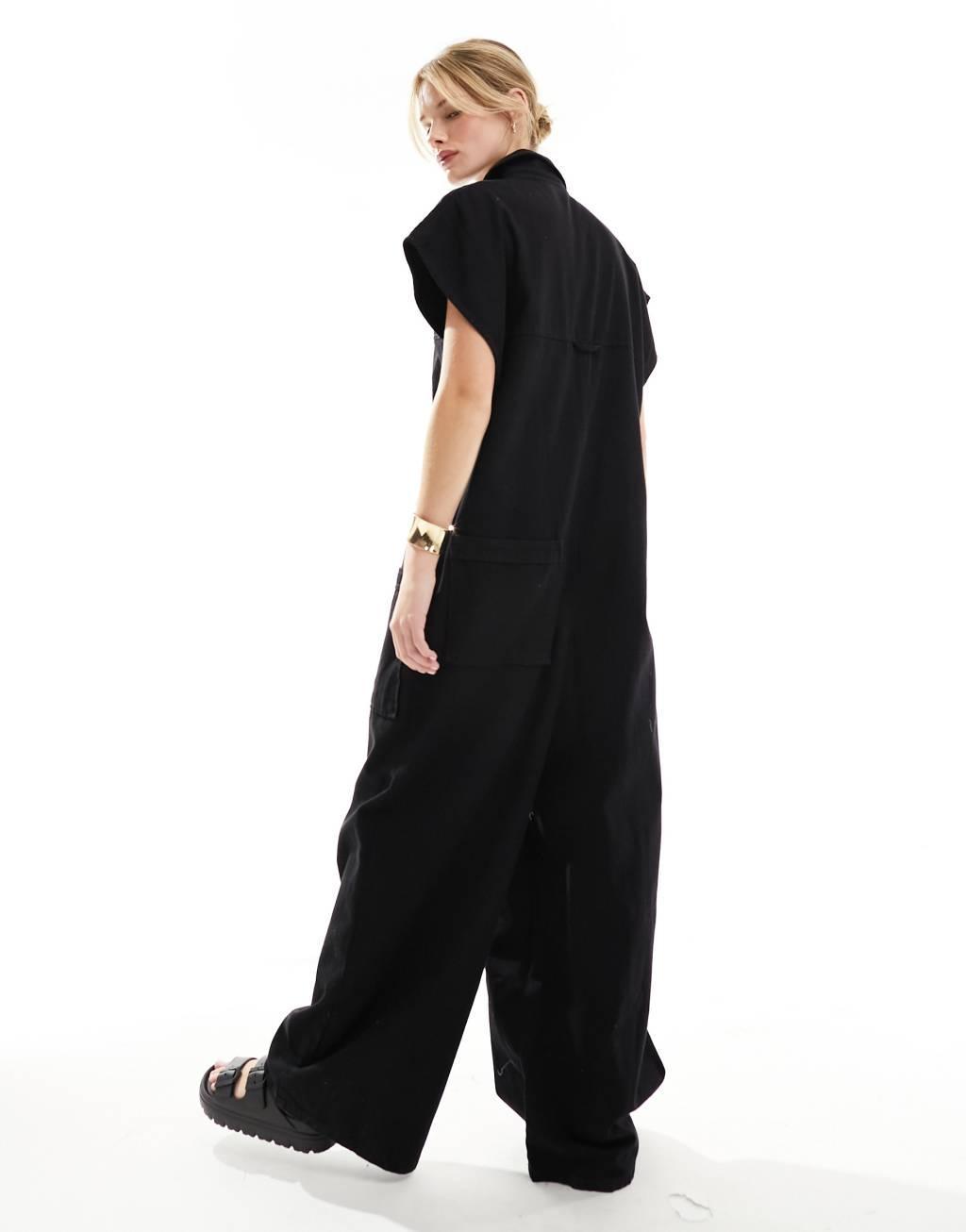 ASOS DESIGN grown on sleeve boiler suit with dropped pockets in black Product Image