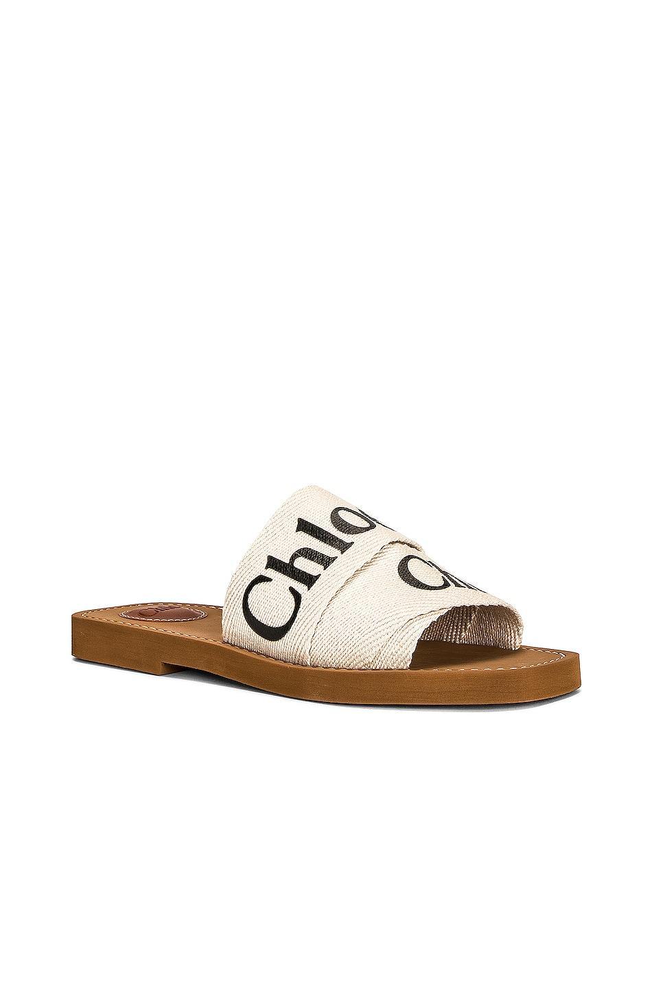 Chloe Woody Flat Slides in White - White. Size 41 (also in 35, 40). Product Image