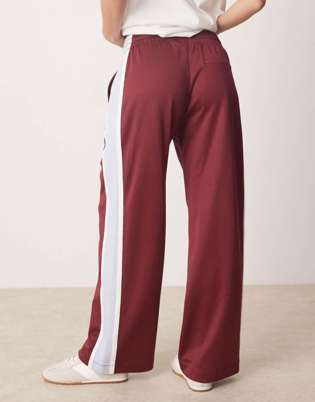 Abercrombie & Fitch mid rise drawstring track pants in red Product Image