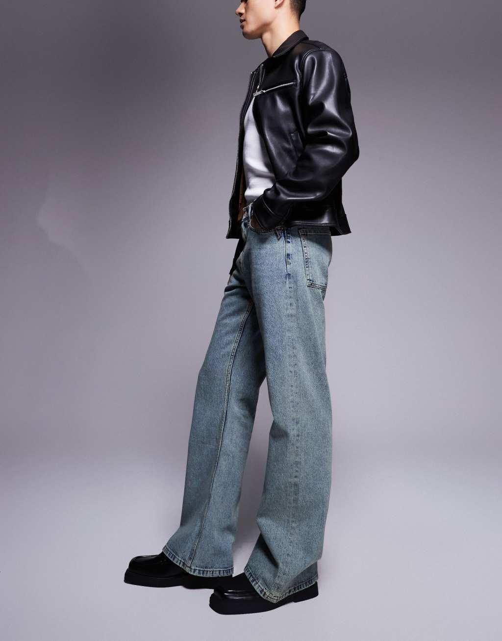 ASOS DESIGN wide flare jeans in light blue vintage tint Product Image