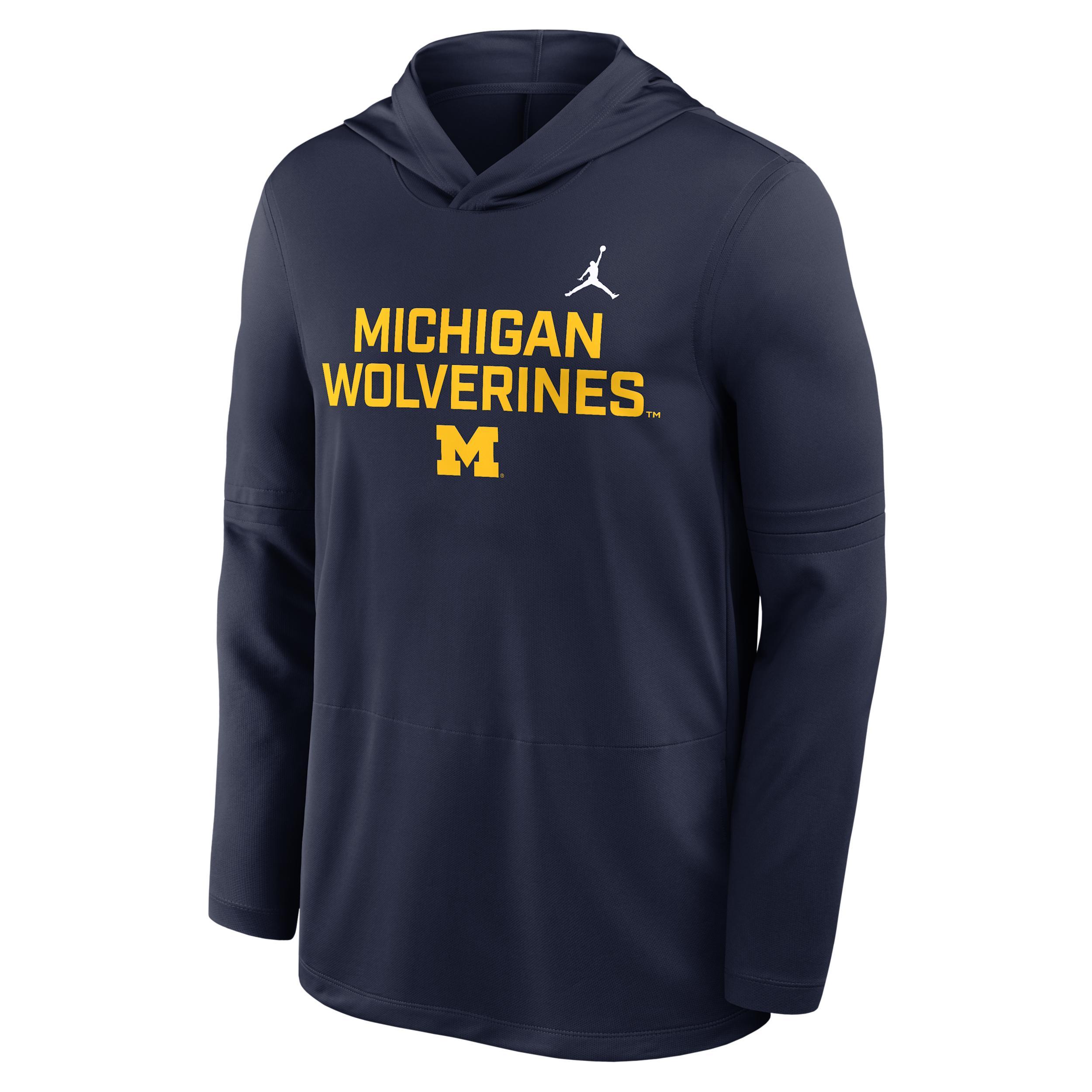Men's Michigan Sideline Jordan Brand Dri-FIT College Long-Sleeve Hooded Top Product Image