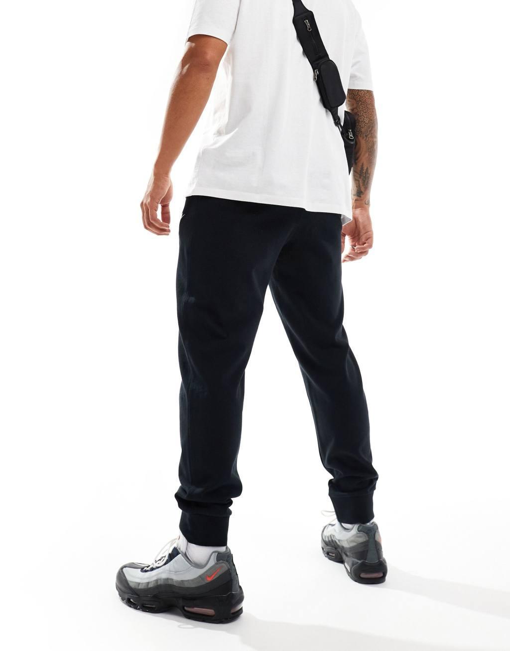 Nike Club Knit sweatpants in black Product Image
