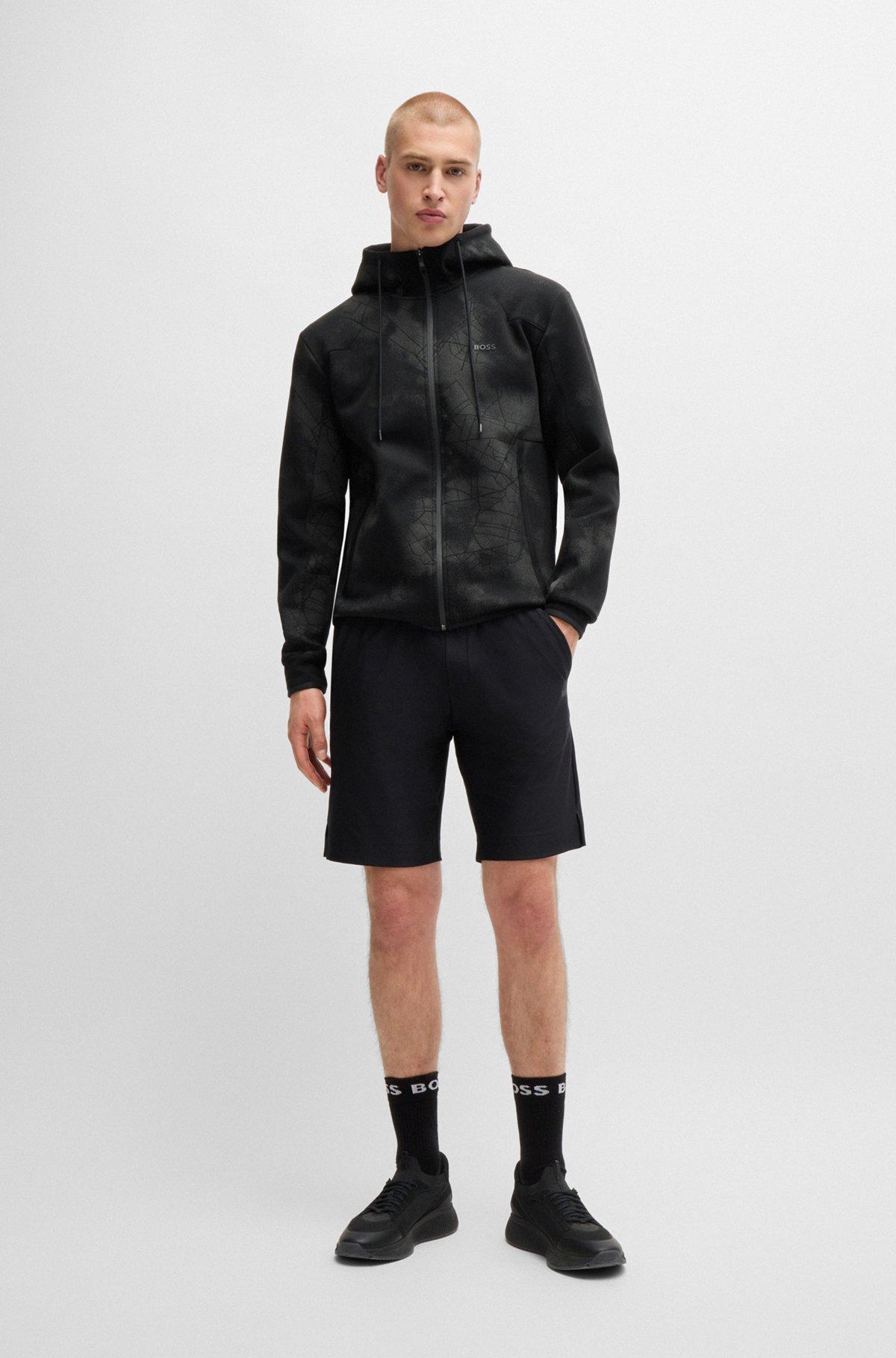Zip-up hoodie with decorative reflective artwork Product Image