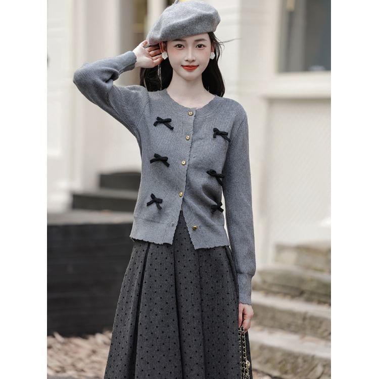 Set: Round Neck Melange Bow Cardigan + High Waist Dotted Midi A-Line Skirt Product Image