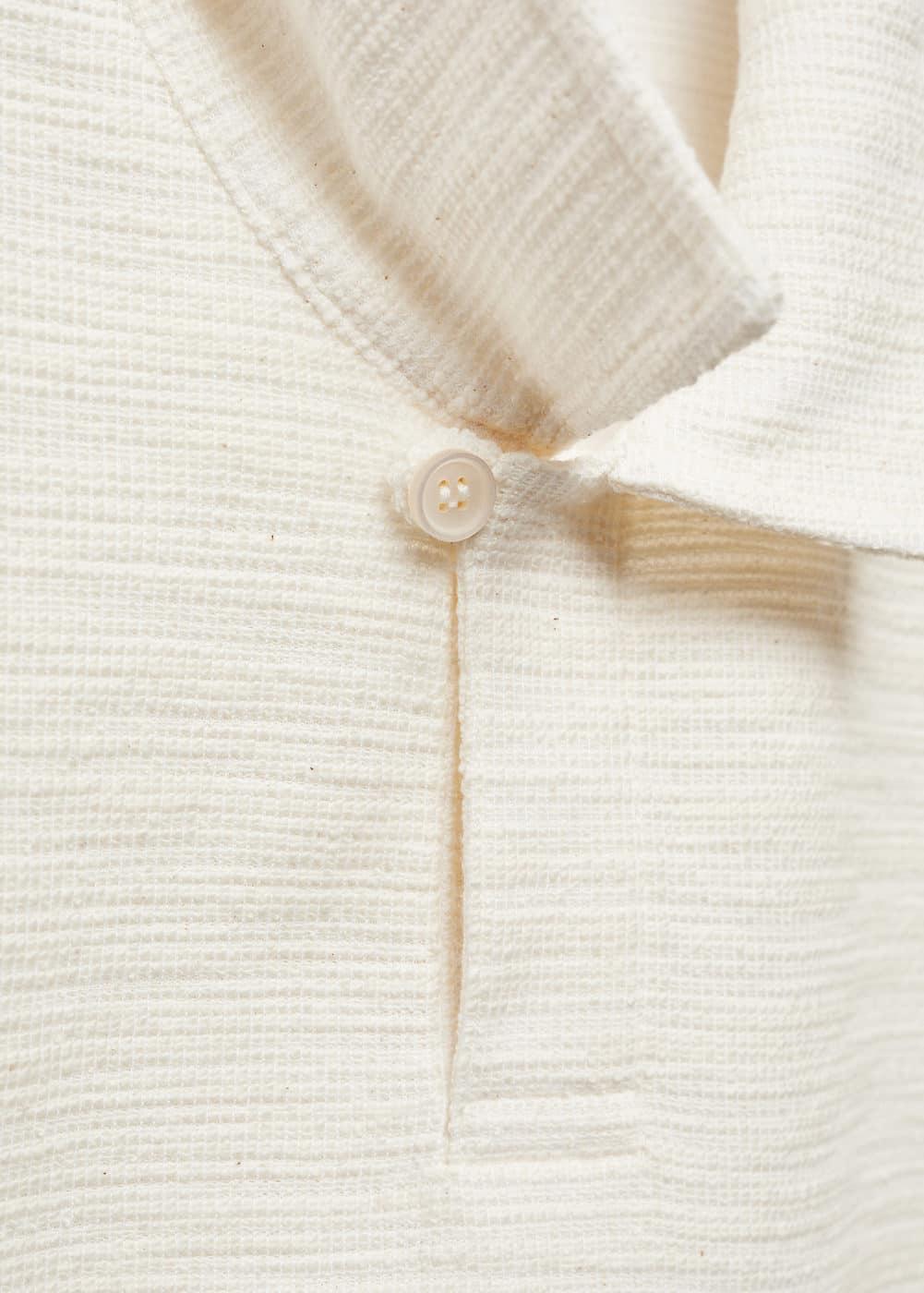 Regular-fit textured knitted polo shirt - Men | MANGO USA Product Image