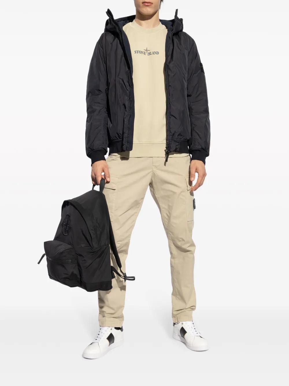 Compass-badge hooded windbreaker Product Image