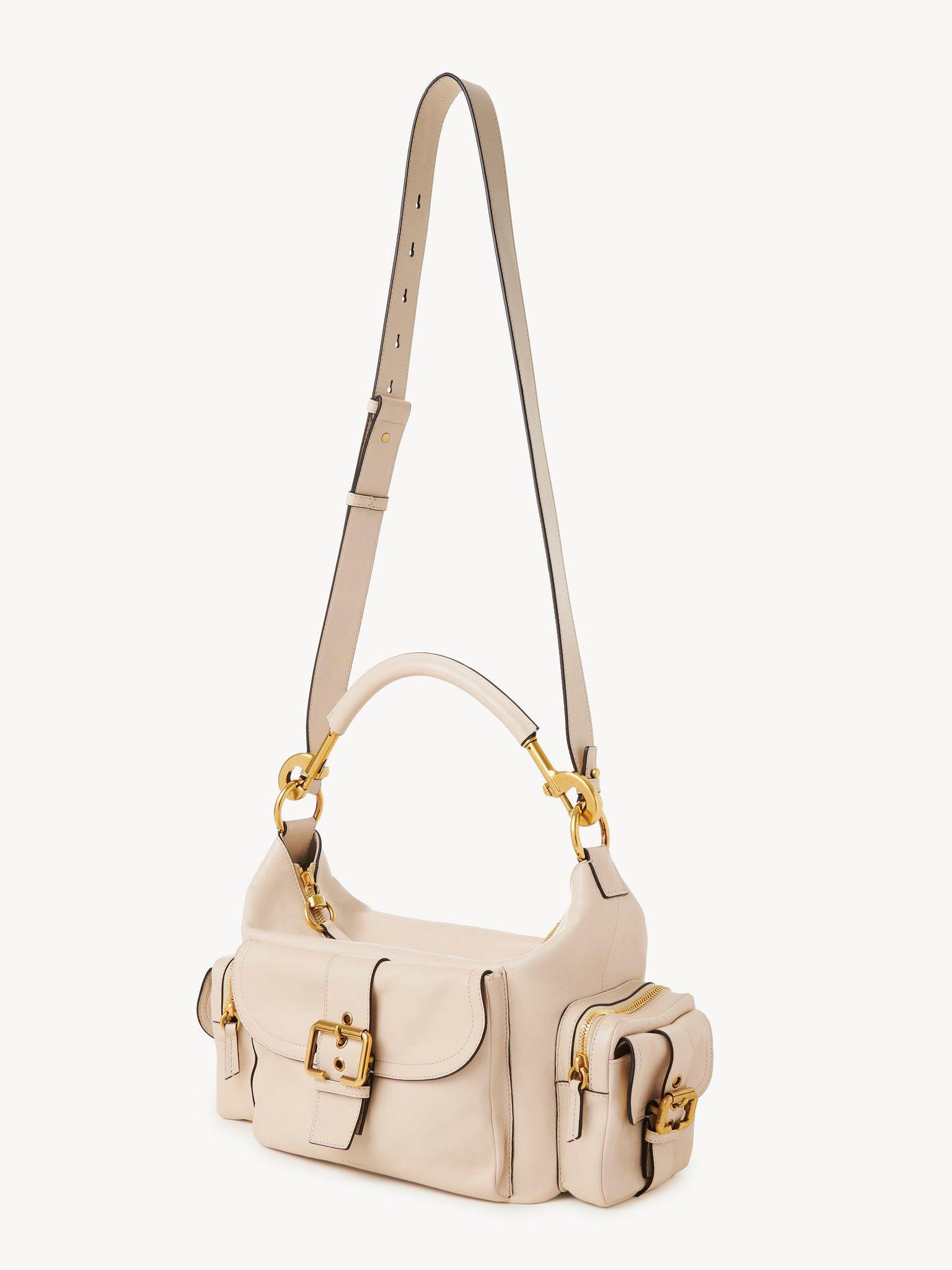Camera bag in shiny leather Product Image