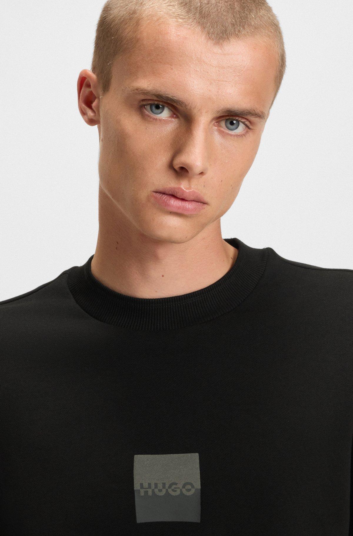 HUGO - Cotton-terry sweatshirt with split logo - Black Product Image