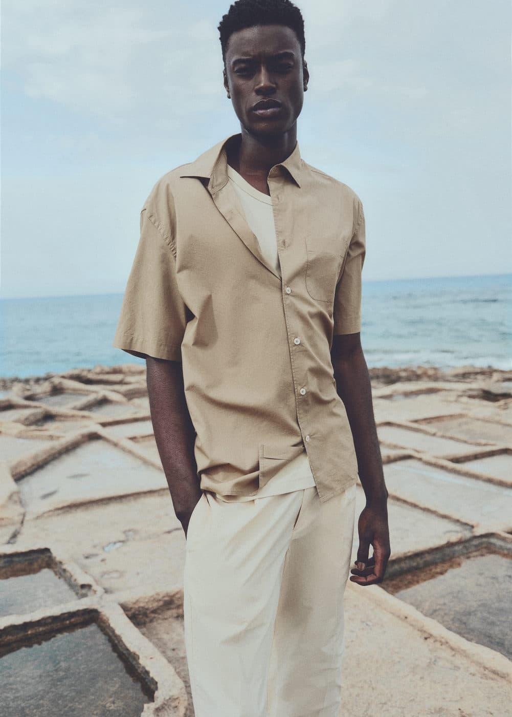 Tencel™™ cotton shirt with pocket - Men | MANGO USA Product Image
