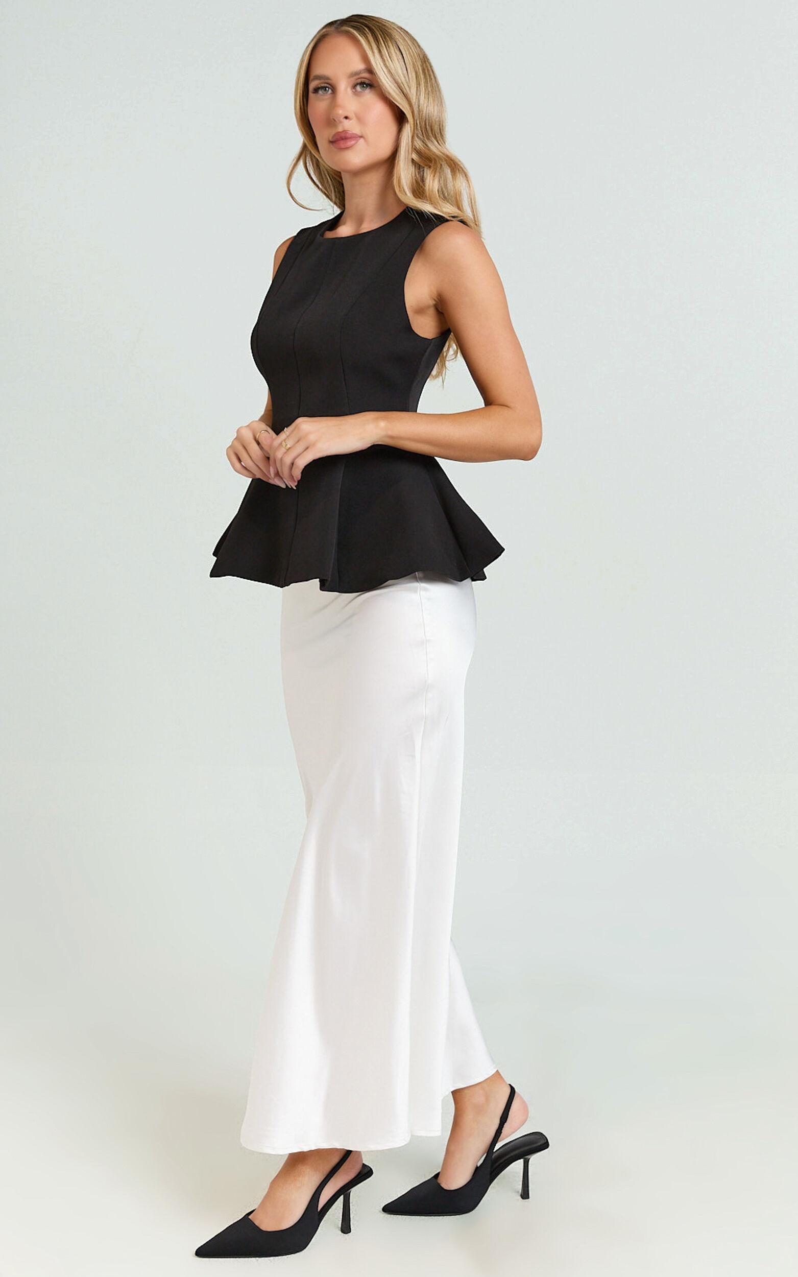Gera Top - Structured Peplum Top in Black Product Image