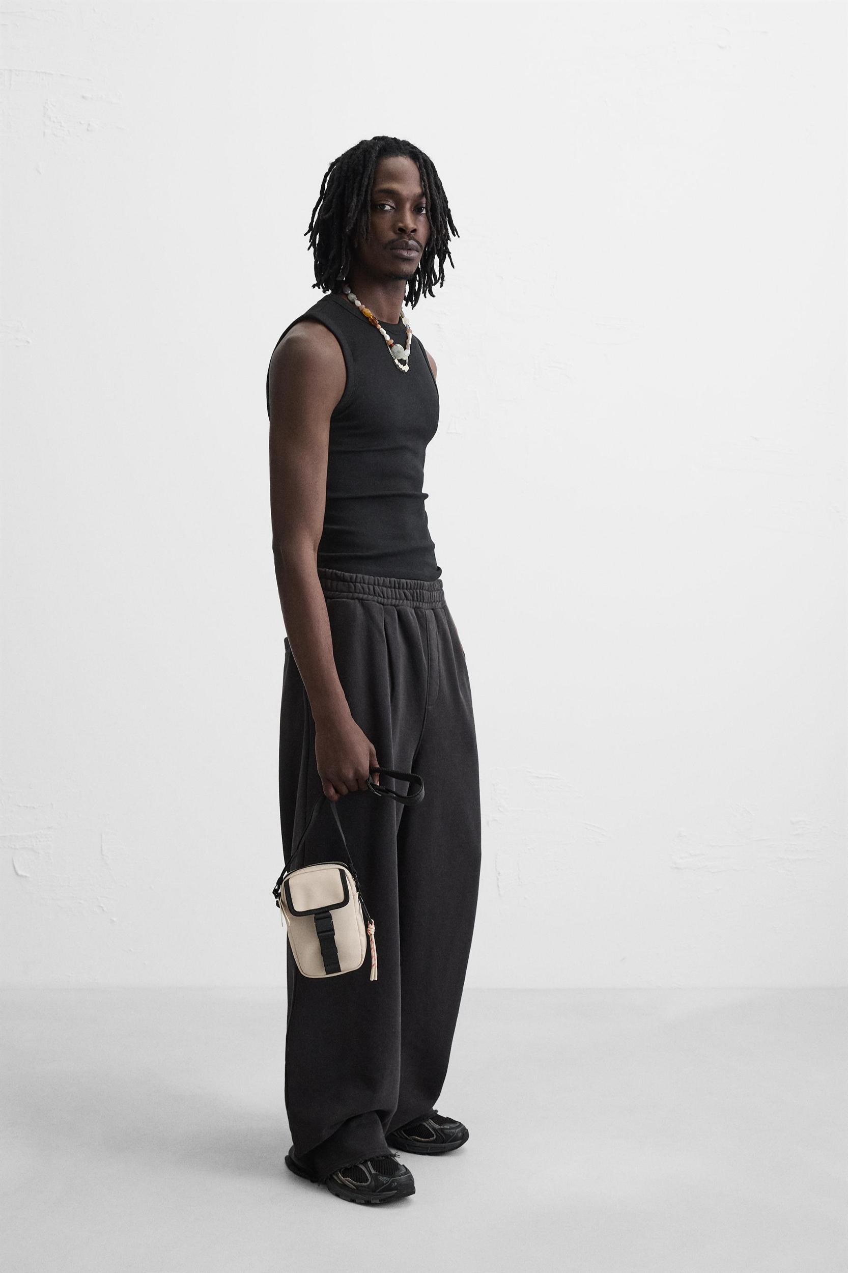 RUBBERIZED CROSSBODY BAG Product Image
