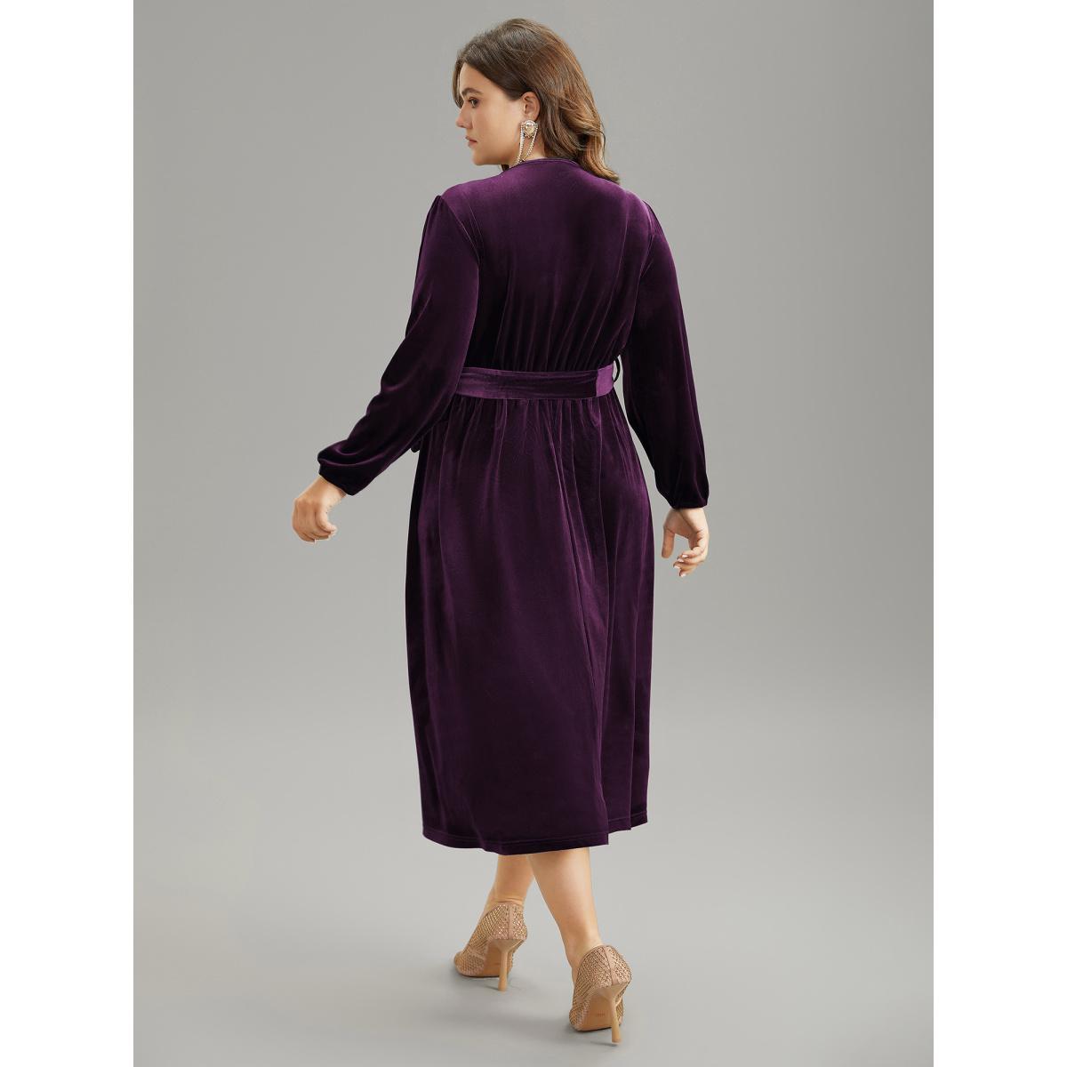 Plus Size Solid Velvet Belted Wrap Arc Hem Dress Deeppurplered Women Elegant Elastic cuffs Overlap Collar Long Sleeve Curvy Midi Dress BloomChic 30/6X Product Image
