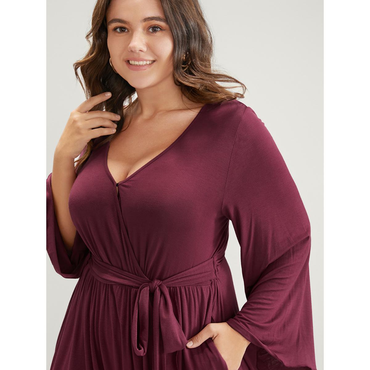 Plus Size Solid Wrap Knotted Front Pocket Bell Sleeve Asymmetrical Hem Dress Burgundy Women Elegant Wrap V-neck Long Sleeve Curvy Midi Dress BloomChic 26/4X Product Image
