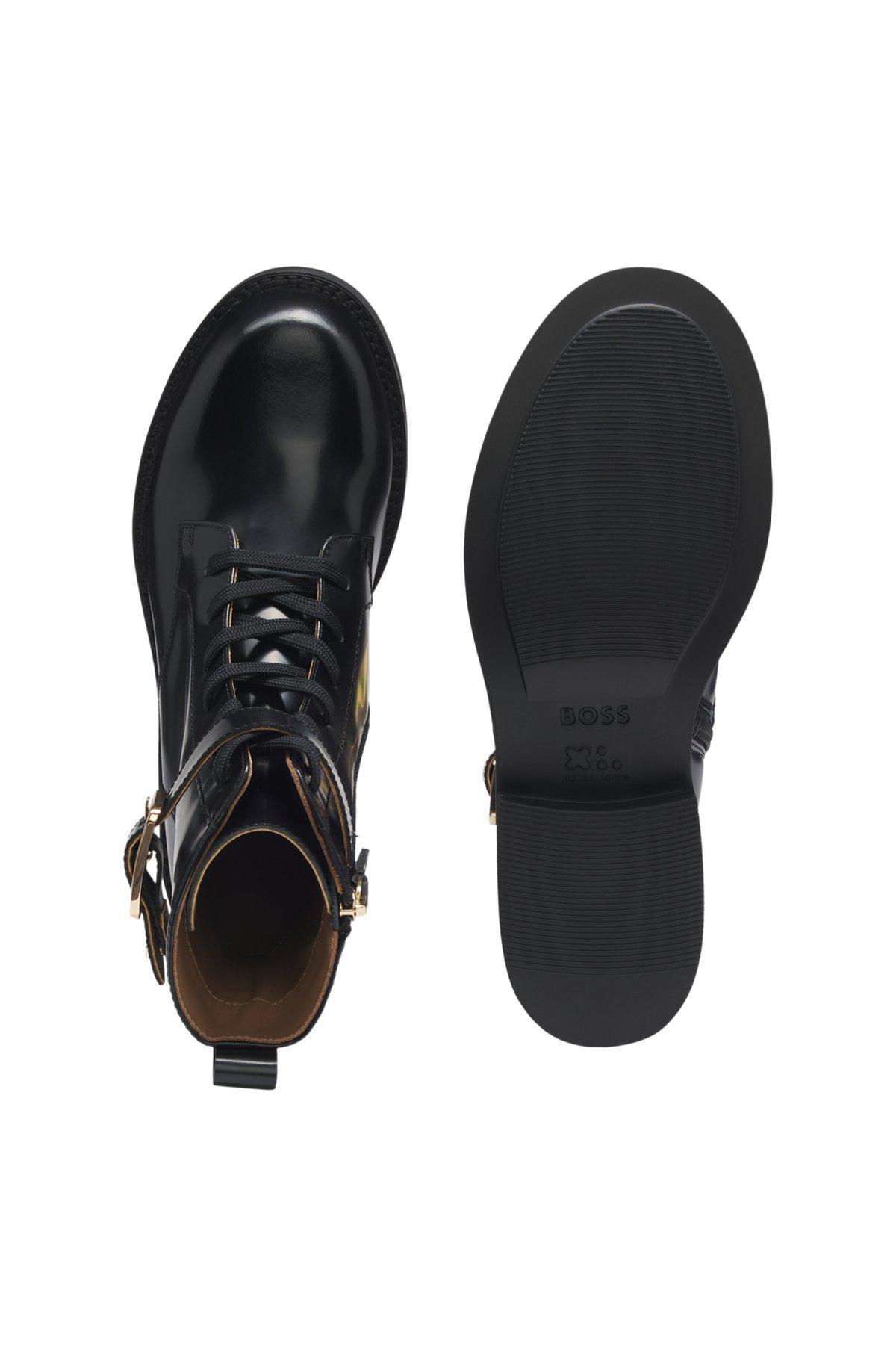 Leather boots with buckle detail Product Image
